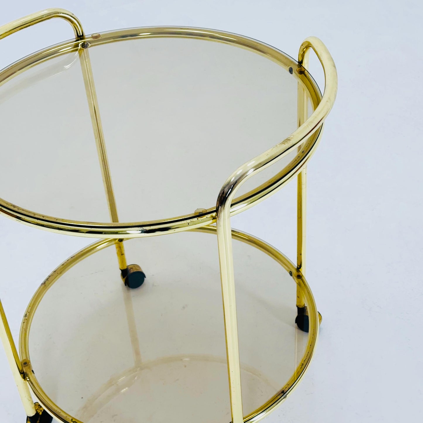 Mid Century Modern Bar/ Tea Cart Gold/Brass smoked Glass France 1970s .