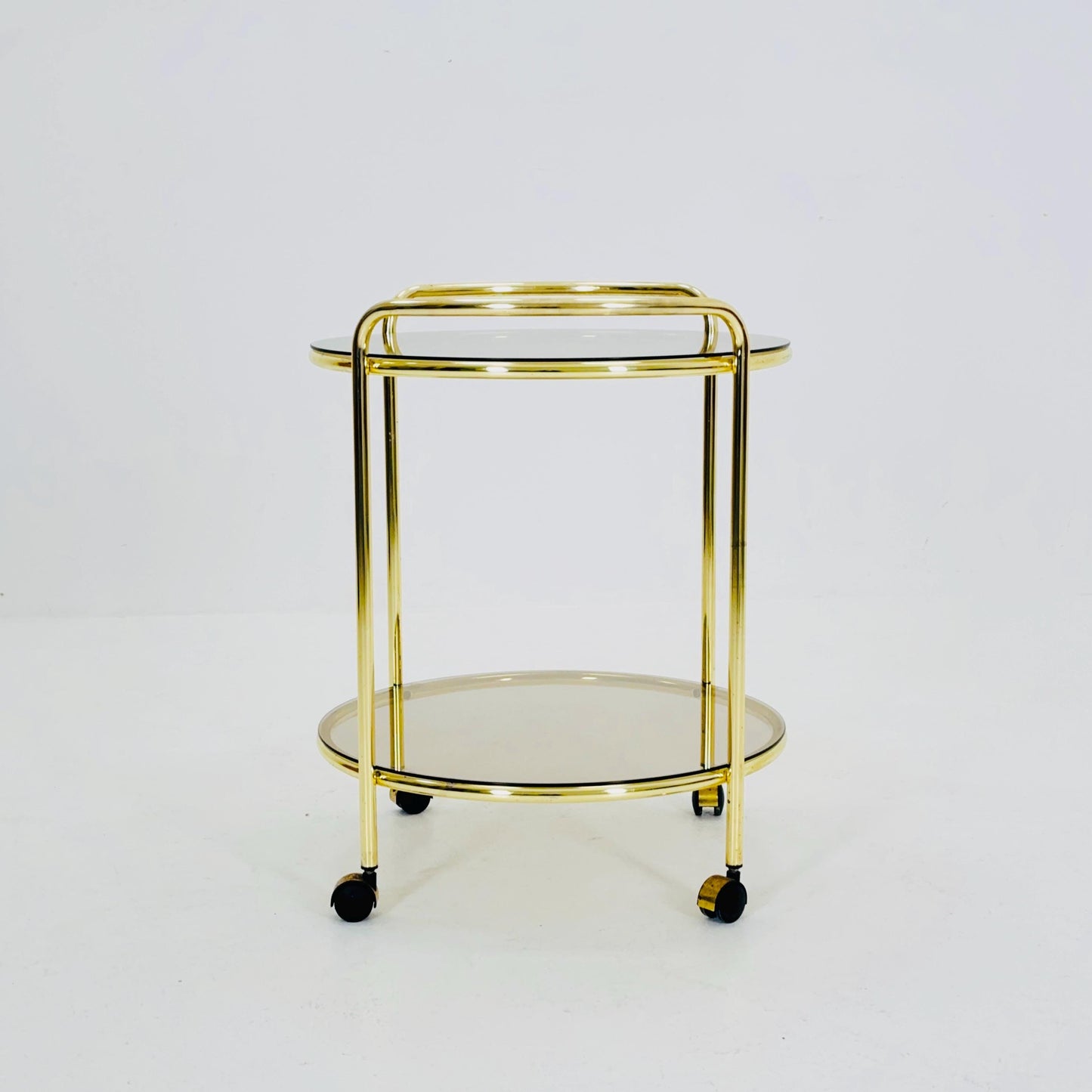 Mid Century Modern Bar/ Tea Cart Gold/Brass smoked Glass France 1970s .