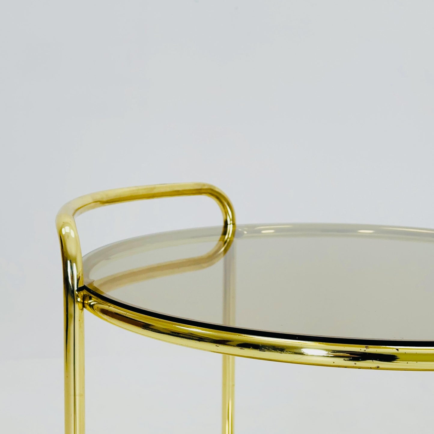 Mid Century Modern Bar/ Tea Cart Gold/Brass smoked Glass France 1970s .