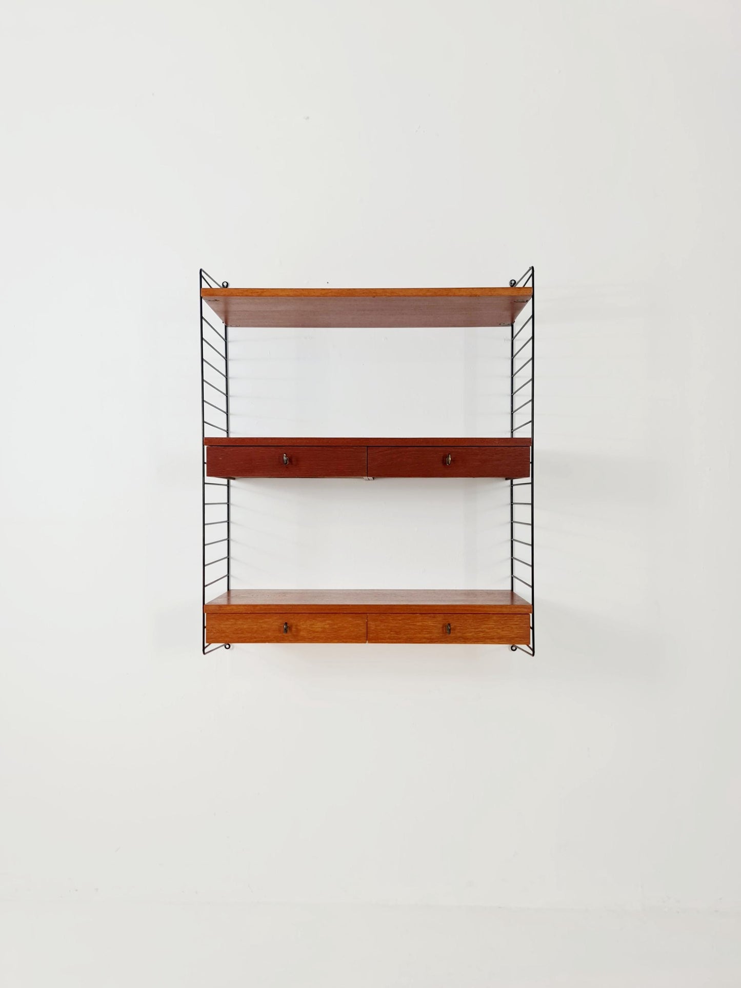 Original MCM Teak shelving system - consists of black lacquered metal ladders, from string Stockholm 1960s