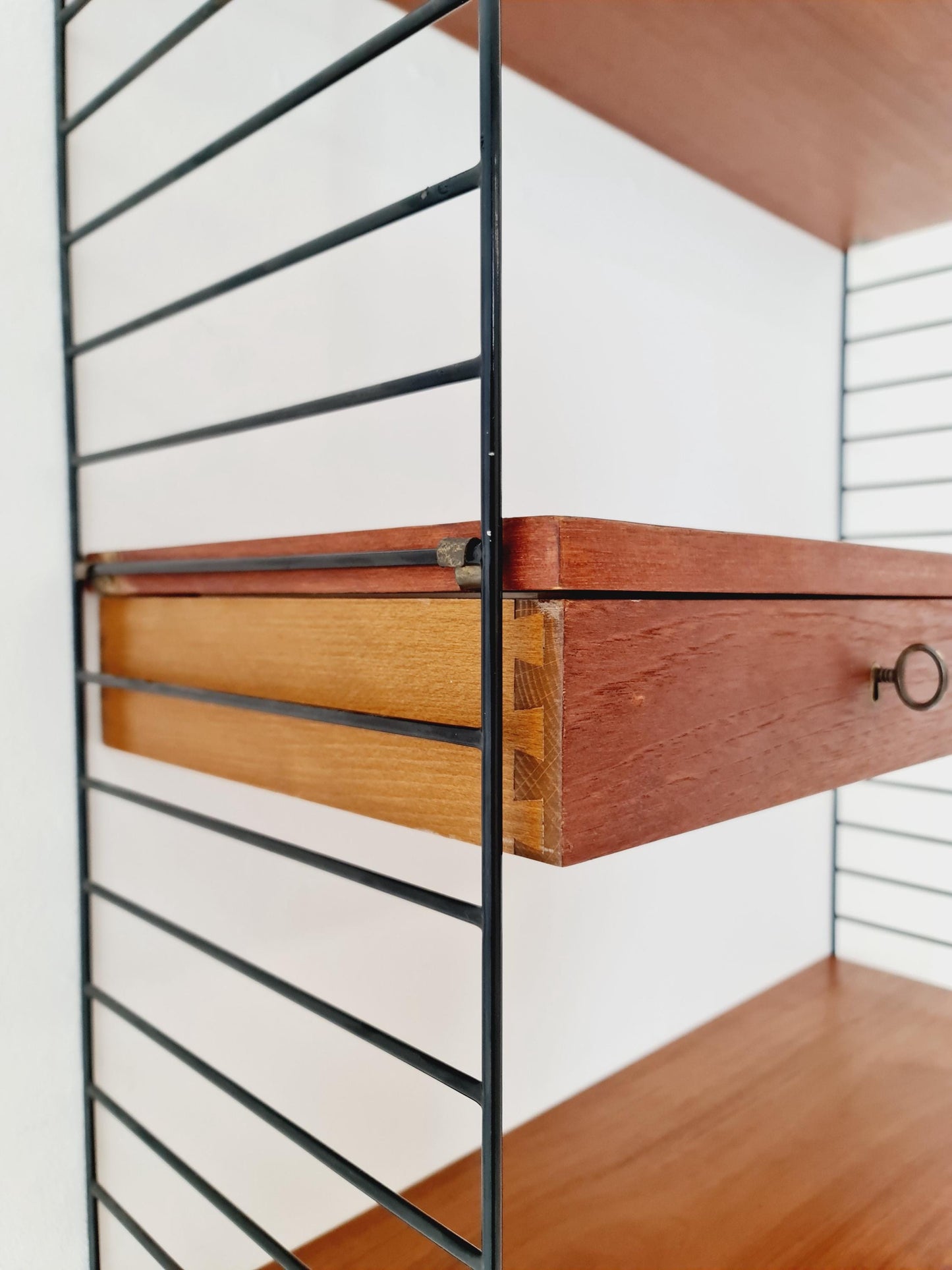 Original MCM Teak shelving system - consists of black lacquered metal ladders, from string Stockholm 1960s