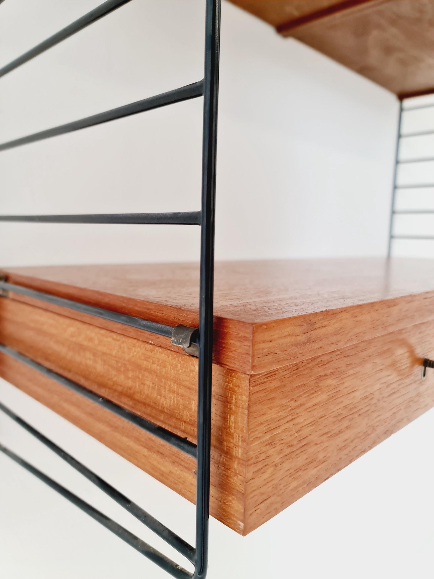 Original MCM Teak shelving system - consists of black lacquered metal ladders, from string Stockholm 1960s