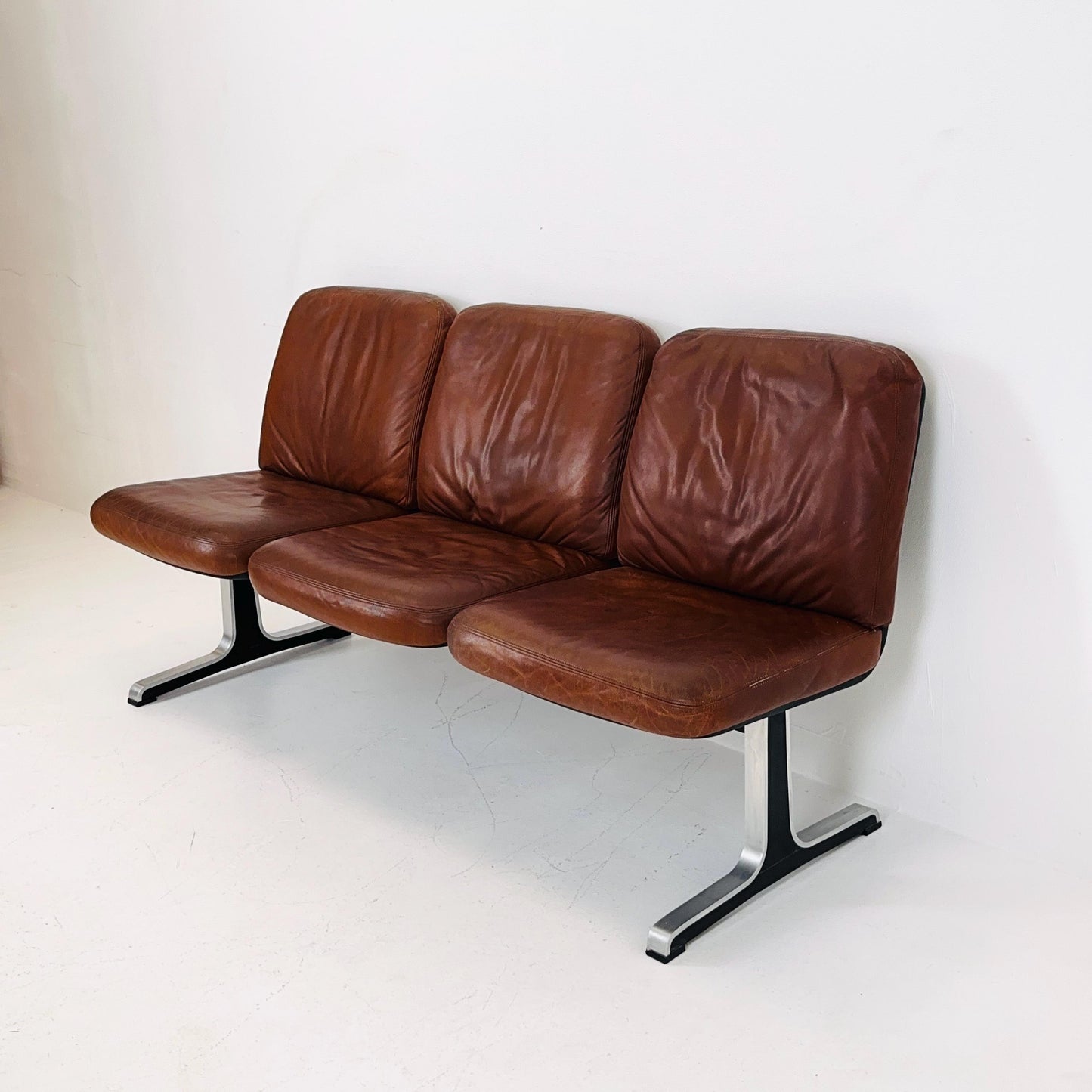 Mid century Bauhaus waiting bench- Sofa in brown leather . Italy 1980s