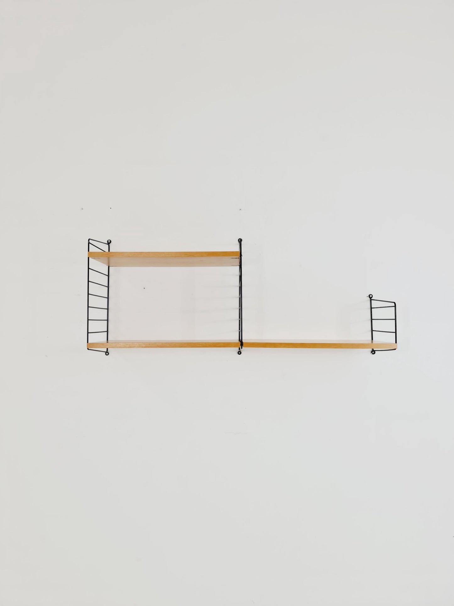 Original MCM Ash shelving system - consists of Black lacquered metal ladders, from string Stockholm 1960s