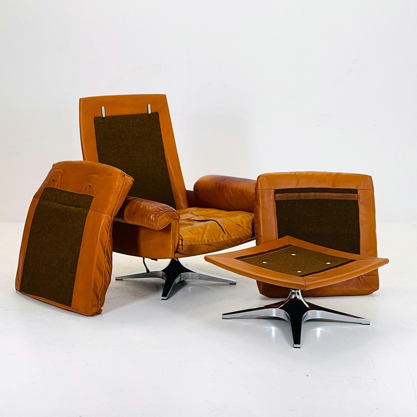 set of Mid Century De Sede "DS-31" armchair and ottoman cognac leather, Switzerland 1970s