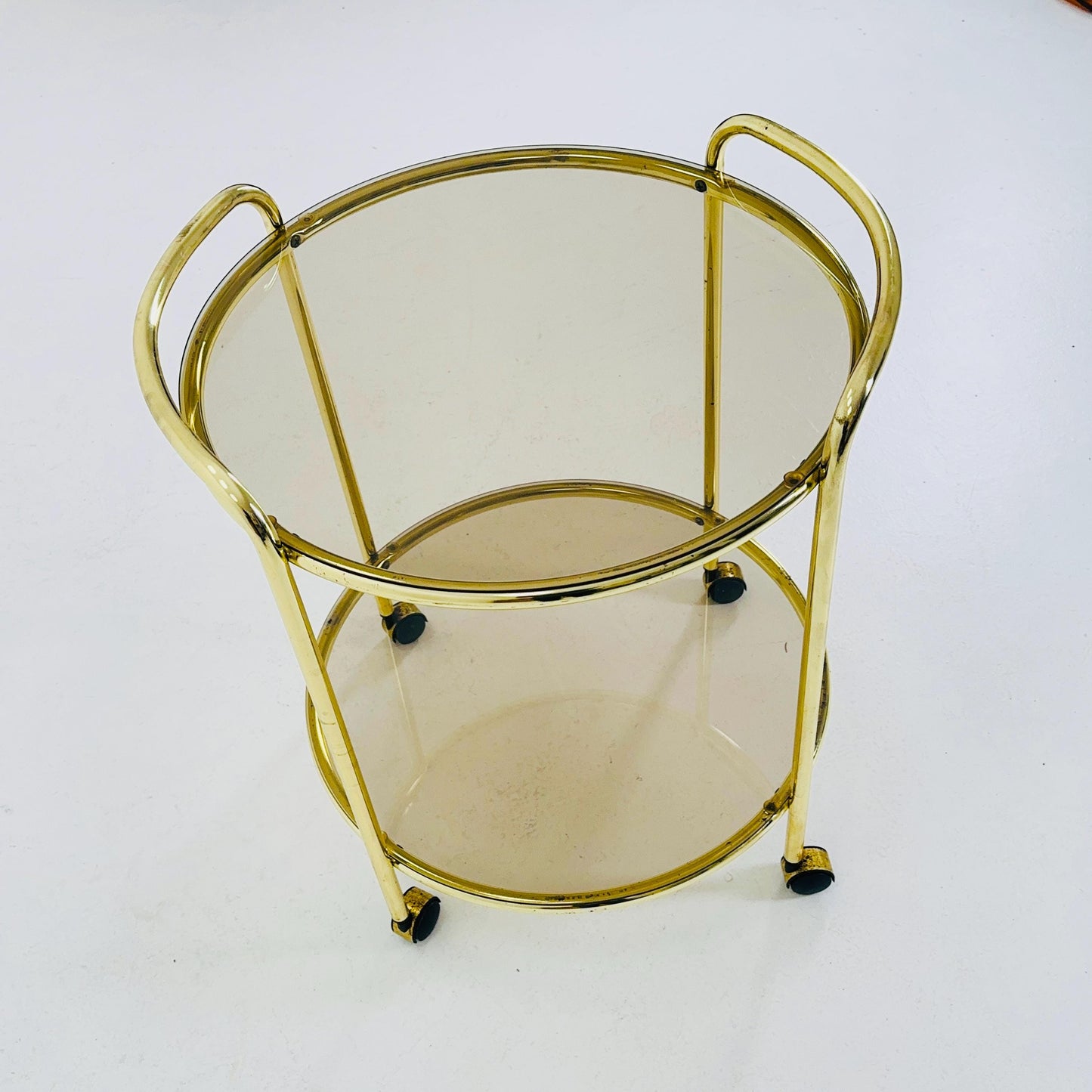 Mid Century Modern Bar/ Tea Cart Gold/Brass smoked Glass France 1970s .