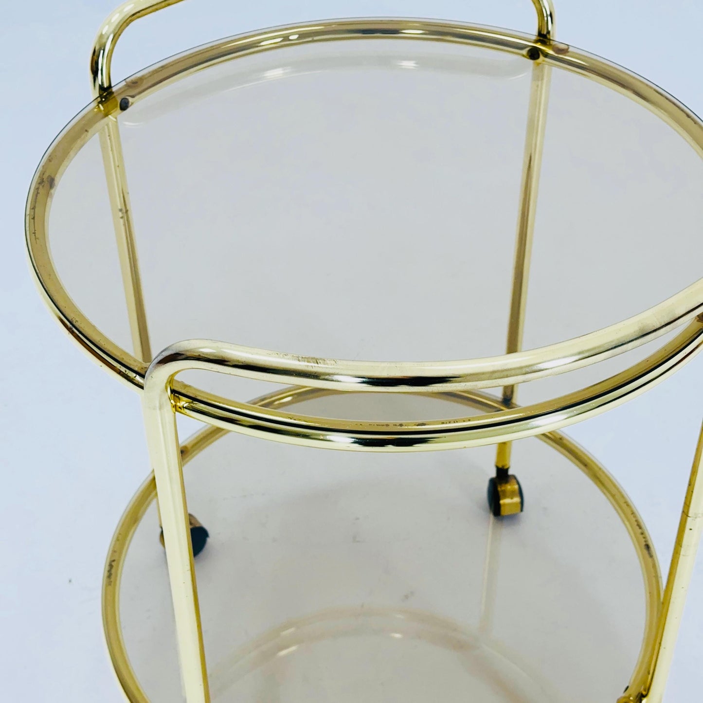 Mid Century Modern Bar/ Tea Cart Gold/Brass smoked Glass France 1970s .