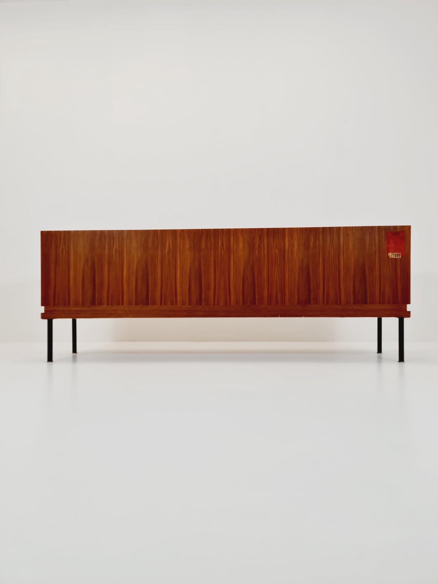 long Mid Century Modern German walnut Sideboard by Famöla Möbel , 1950s