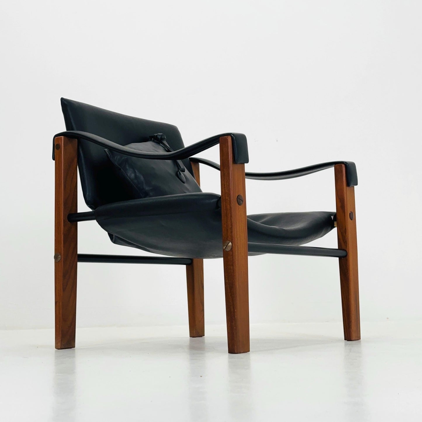 Mid century black leather Safari armchairs from Arkana by Maurice Burke, United Kingdom 1970s Scotland