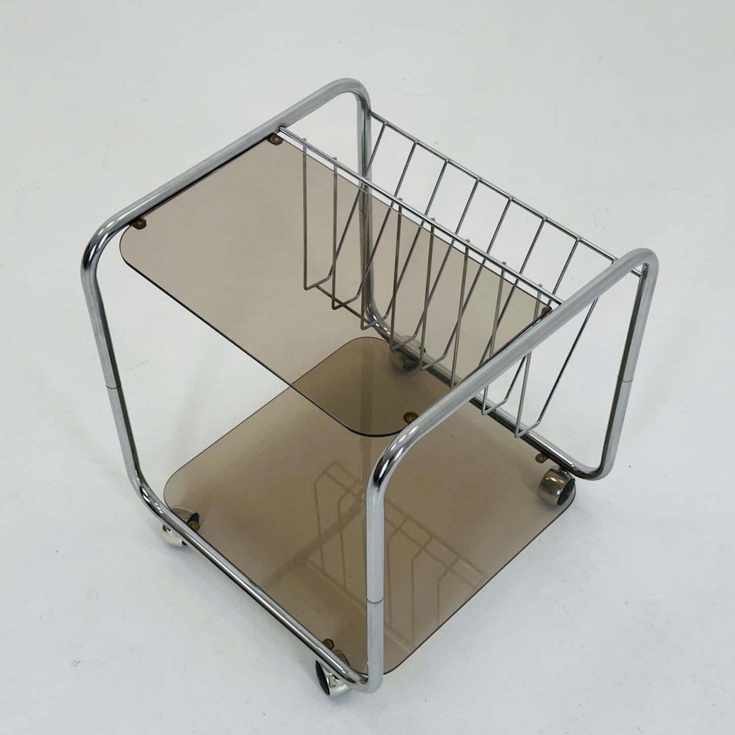 Mid century Chrome bar cart/serving trolley. magazine rack Smoked glass ,Bauhaus Germany 1980s