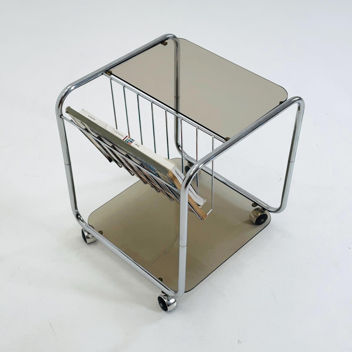 Mid century Chrome bar cart/serving trolley. magazine rack Smoked glass ,Bauhaus Germany 1980s