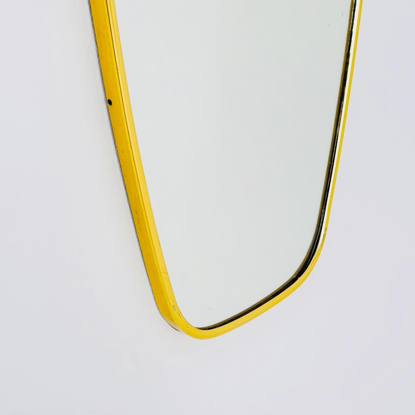Mid Century asymmetric German brass Original kidney wall mirror from the 60s