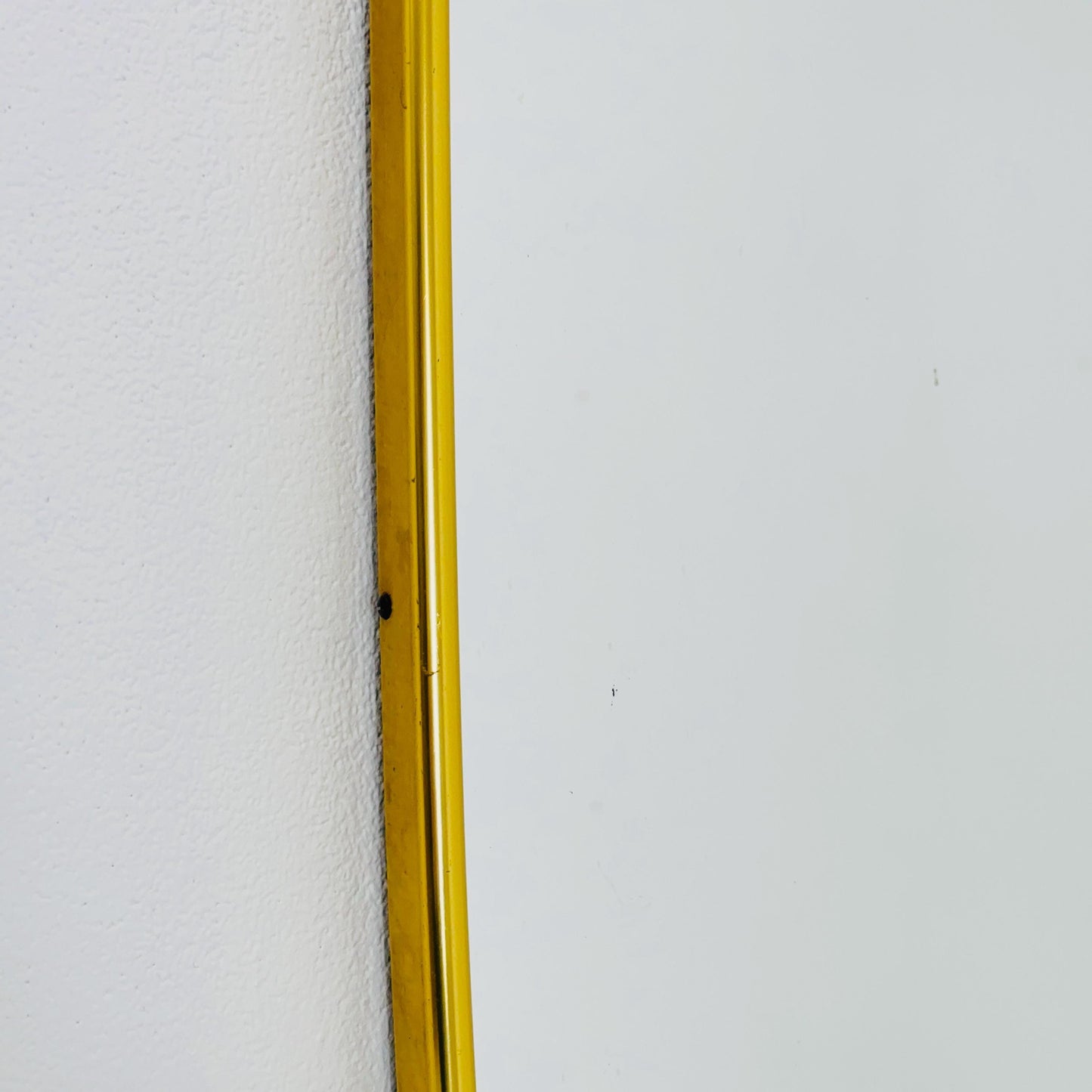Mid Century asymmetric German brass Original kidney wall mirror from the 60s