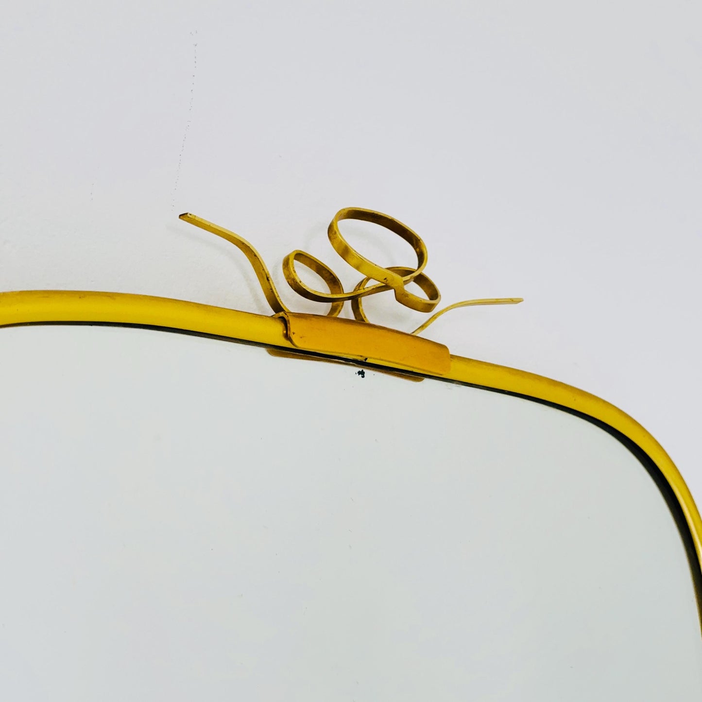 Mid Century asymmetric German brass Original kidney wall mirror from the 60s