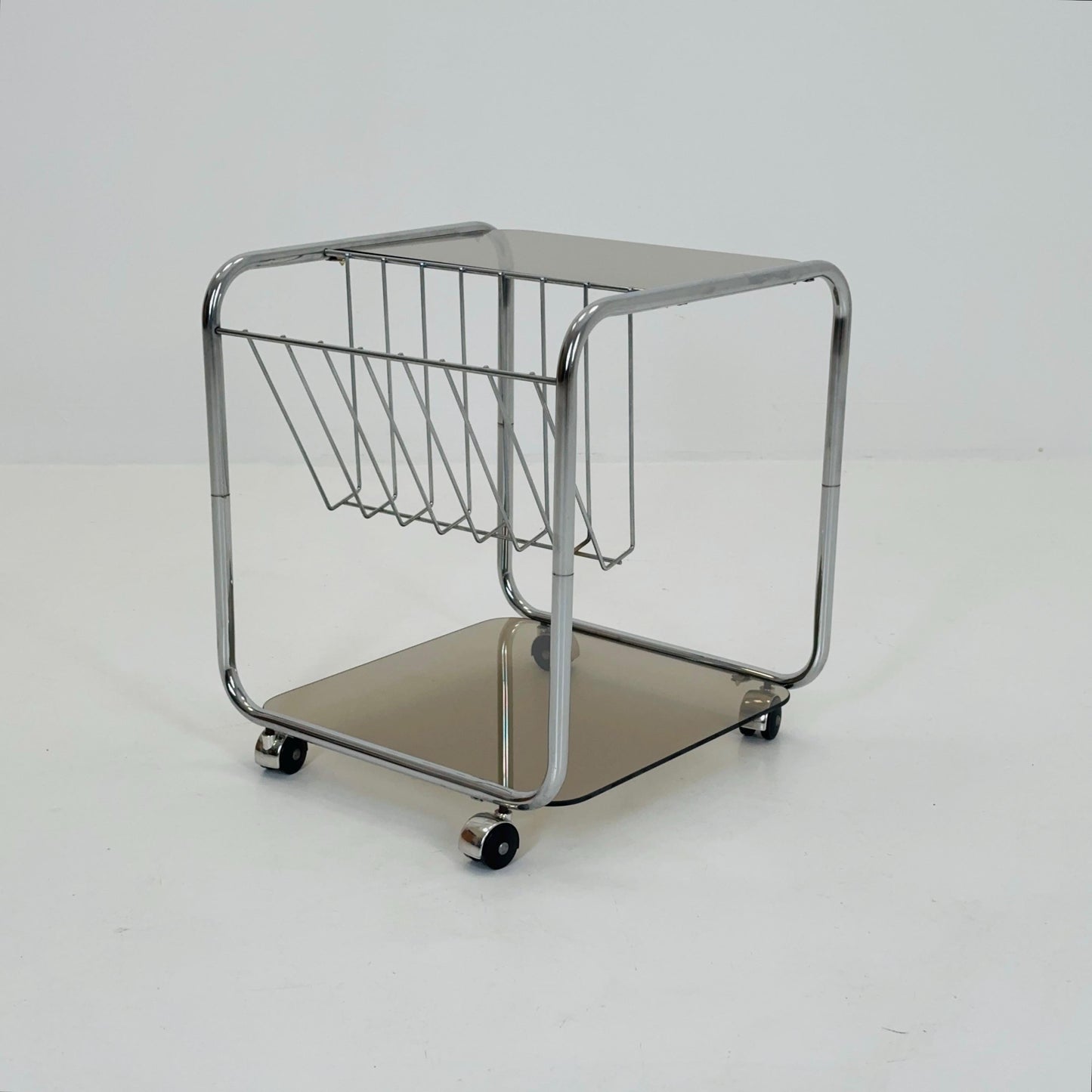 Mid century Chrome bar cart/serving trolley. magazine rack Smoked glass ,Bauhaus Germany 1980s