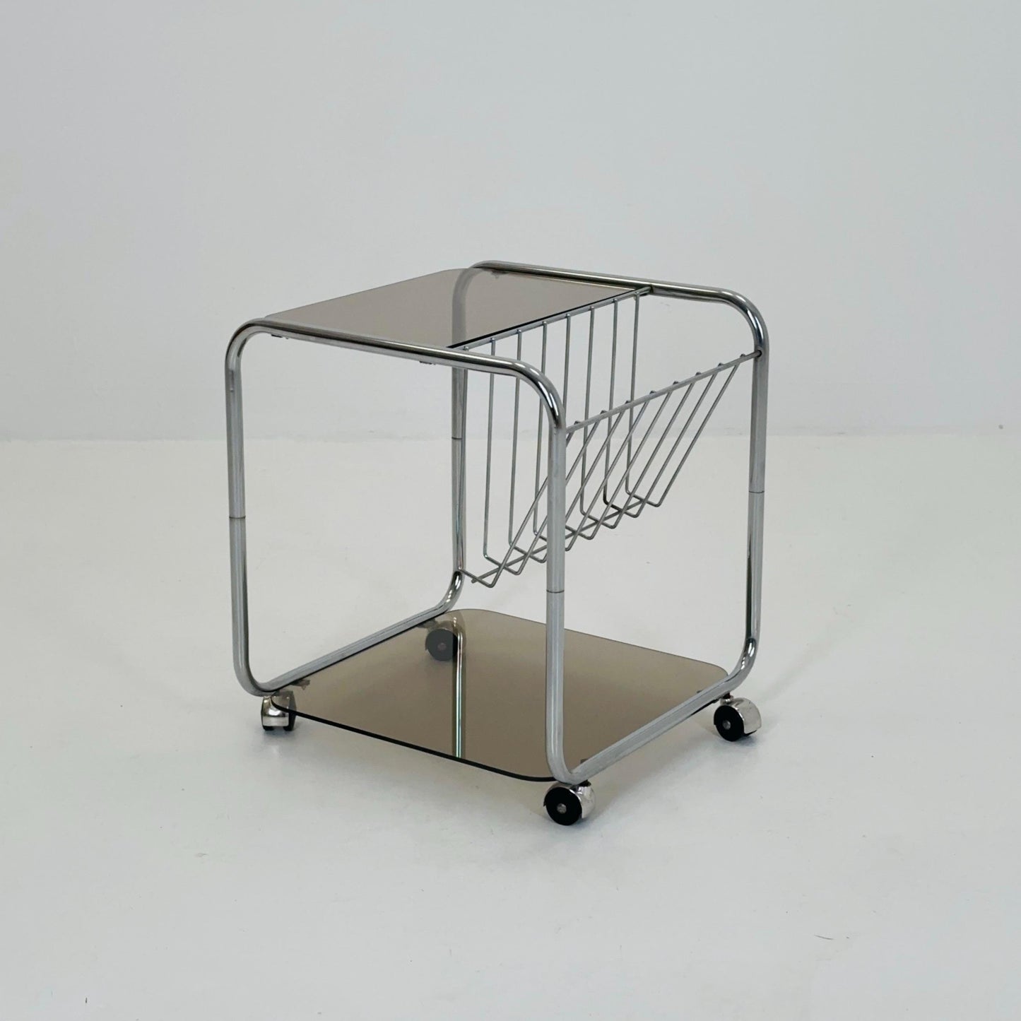 Mid century Chrome bar cart/serving trolley. magazine rack Smoked glass ,Bauhaus Germany 1980s