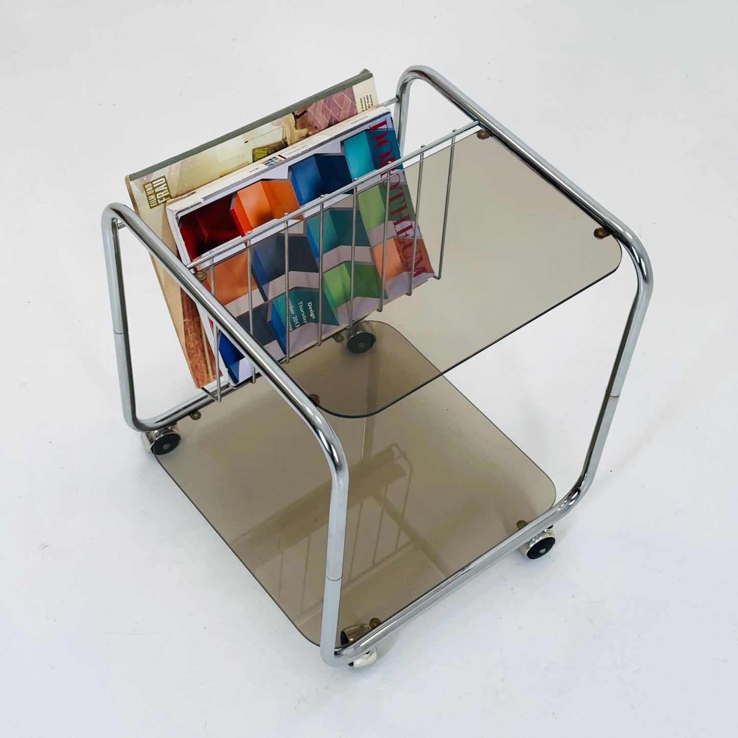 Mid century Chrome bar cart/serving trolley. magazine rack Smoked glass ,Bauhaus Germany 1980s