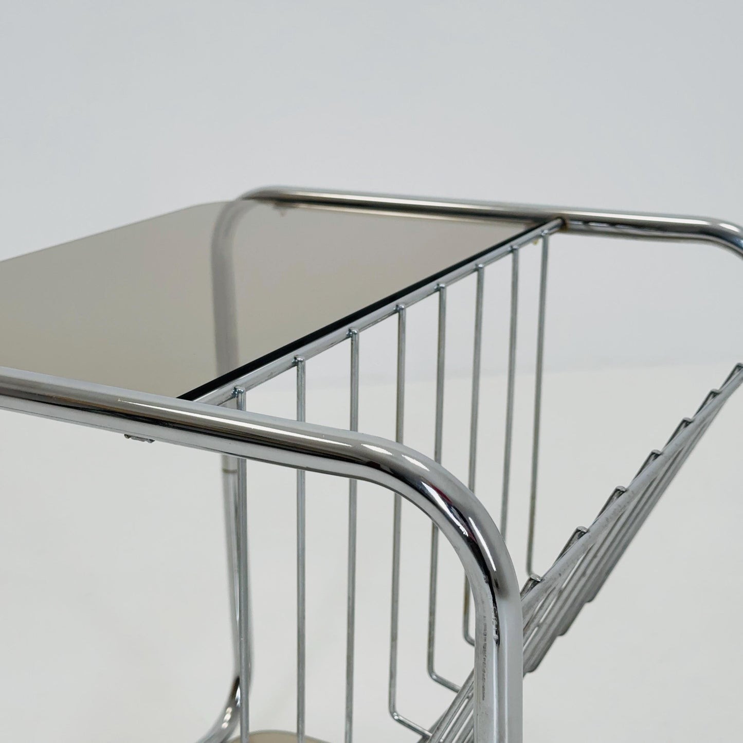 Mid century Chrome bar cart/serving trolley. magazine rack Smoked glass ,Bauhaus Germany 1980s
