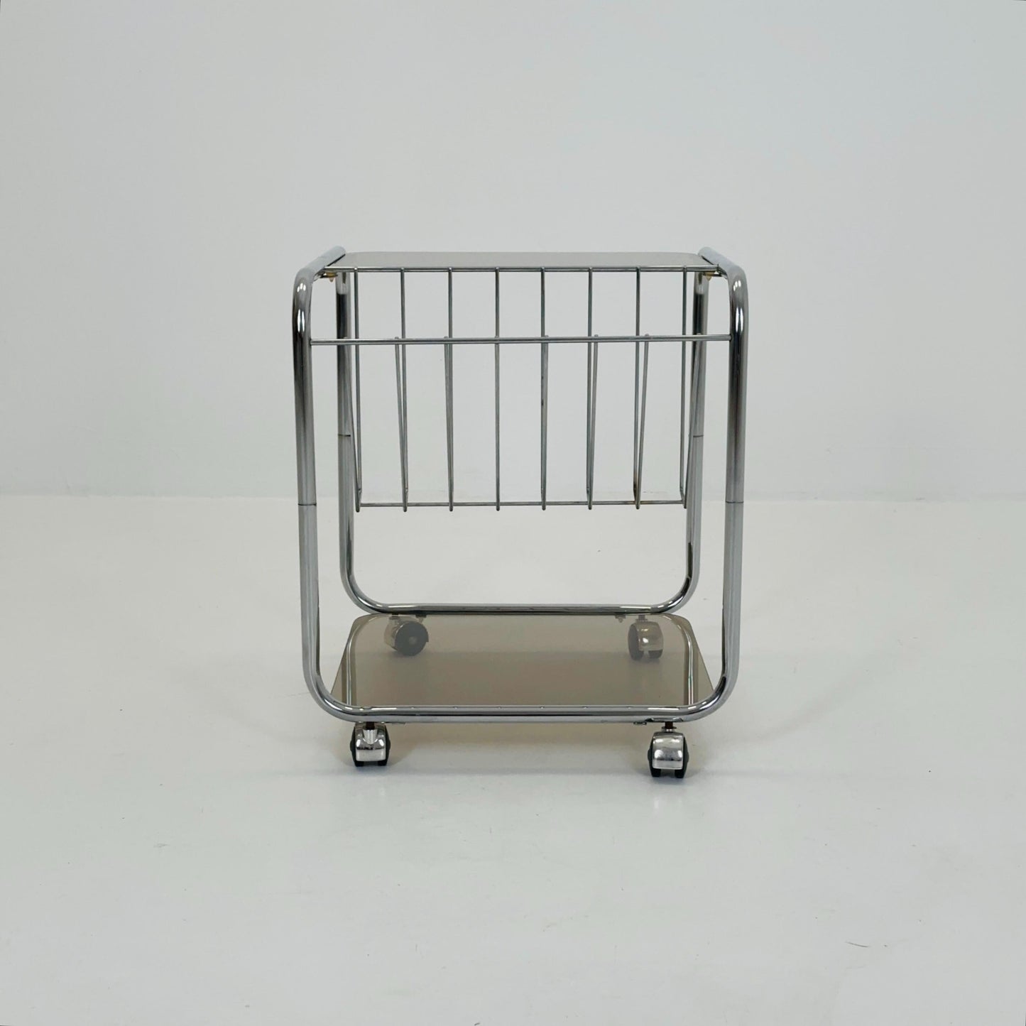 Mid century Chrome bar cart/serving trolley. magazine rack Smoked glass ,Bauhaus Germany 1980s