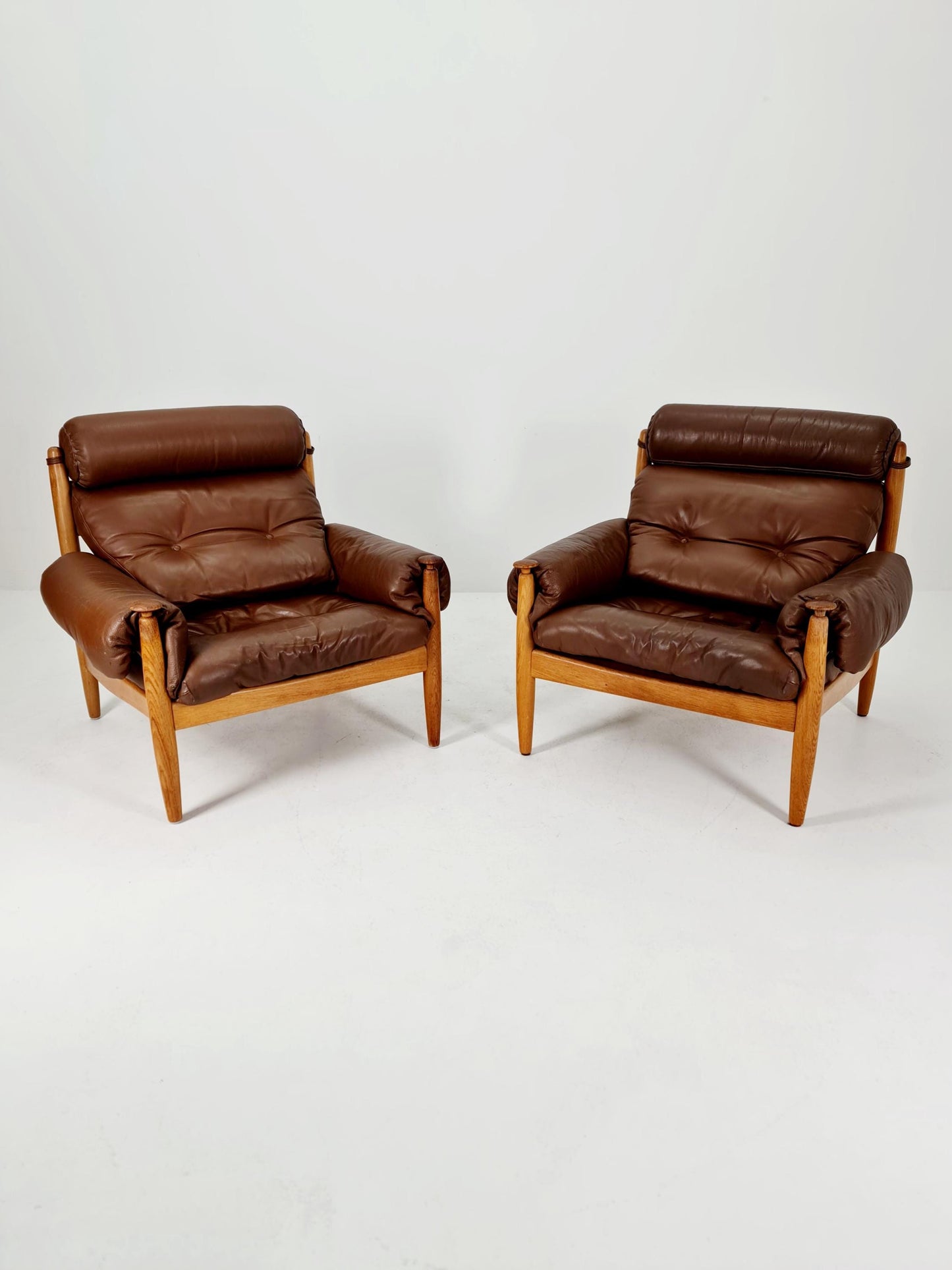 mid century armchairs By Eric Merthen for ire möbler in leather and Oak wood , Sweden 1960s Set of 2
