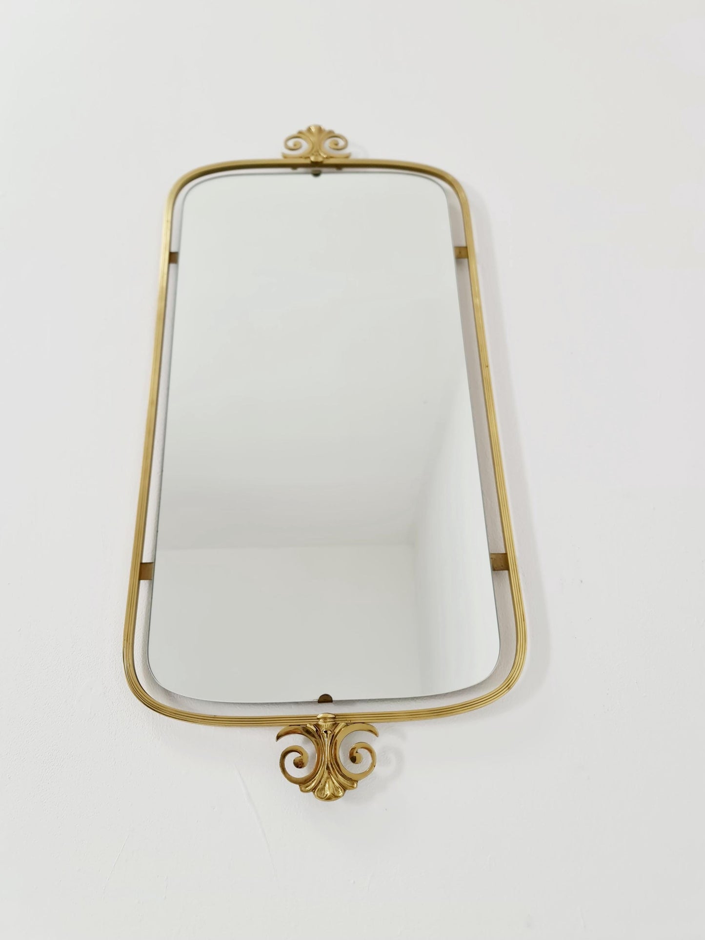 Mid Century asymmetric German brass Original kidney wall mirror from the 60s