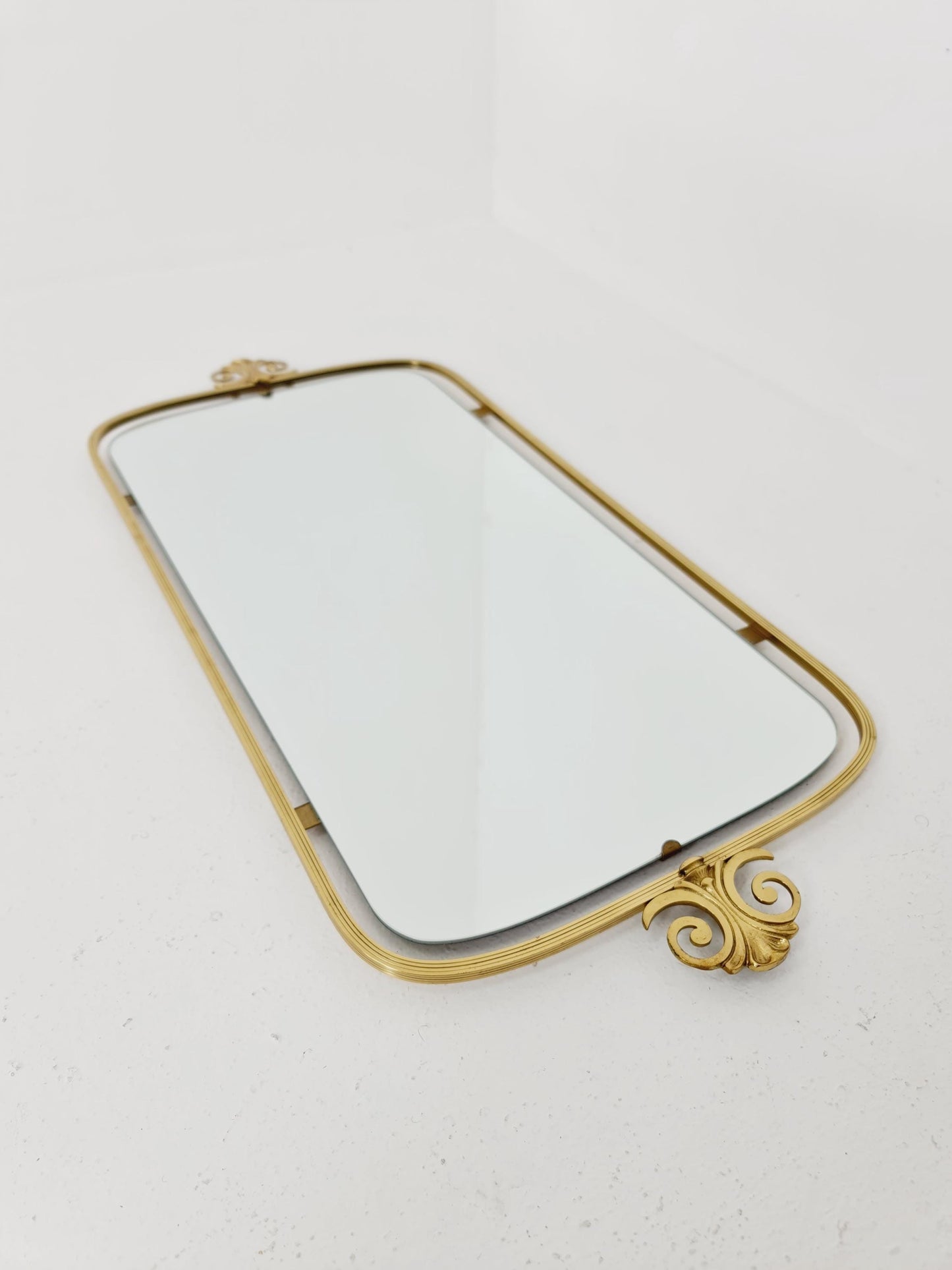 Mid Century asymmetric German brass Original kidney wall mirror from the 60s