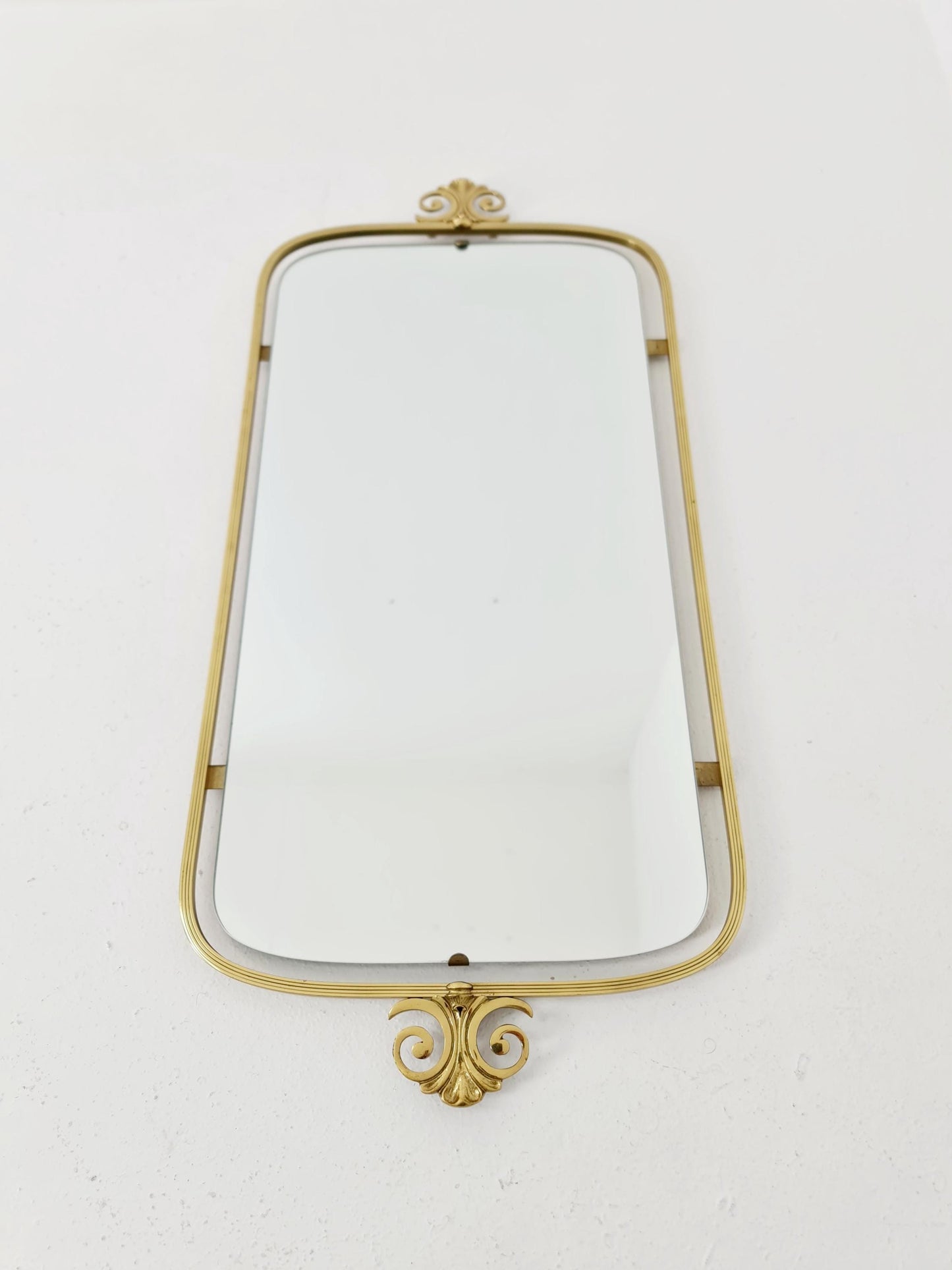 Mid Century asymmetric German brass Original kidney wall mirror from the 60s