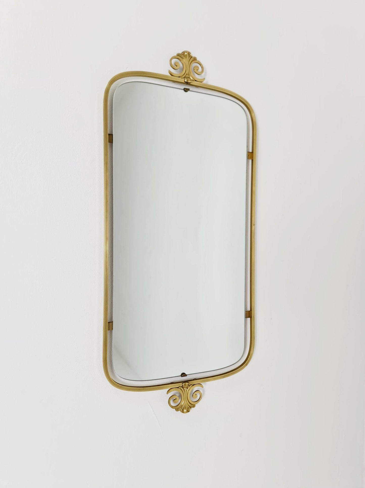 Mid Century asymmetric German brass Original kidney wall mirror from the 60s