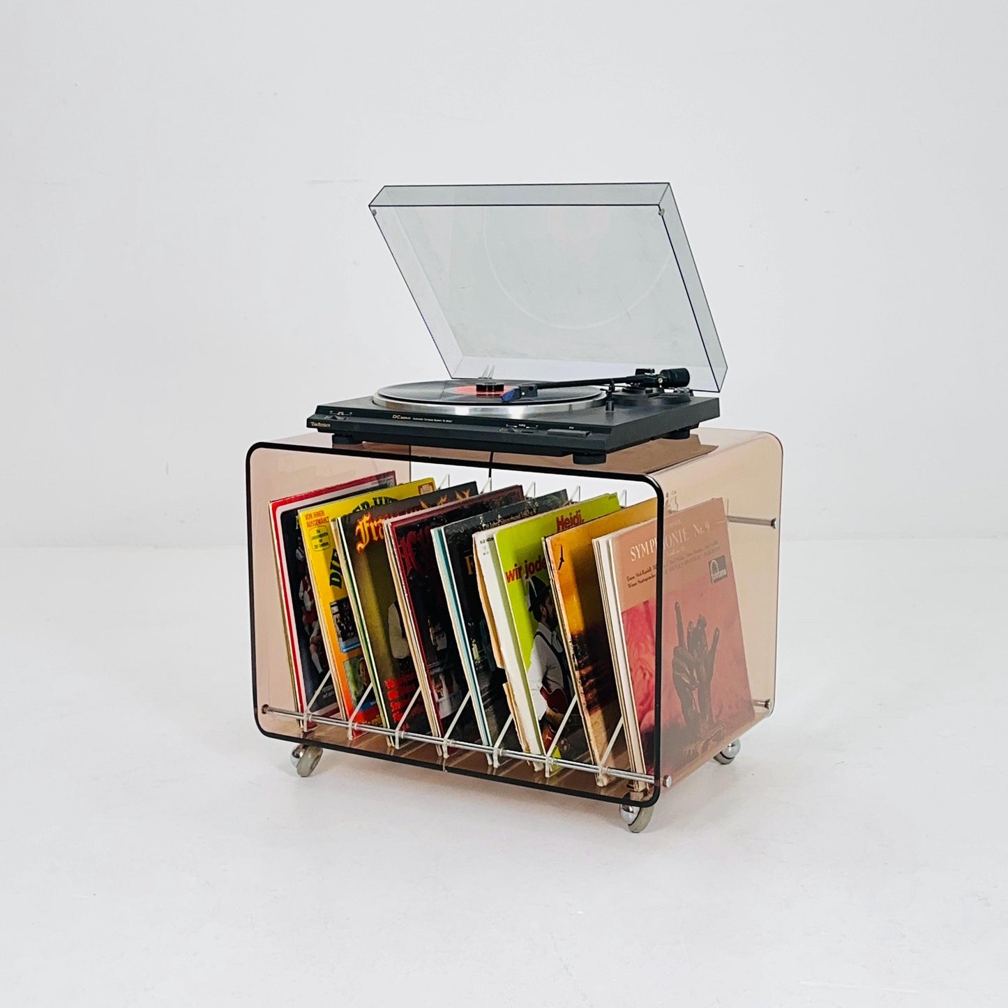 Space age Smoked Brown Plexiglass vinyl storage /Trolley by Michel Dumas for Roche Bobois 1970s