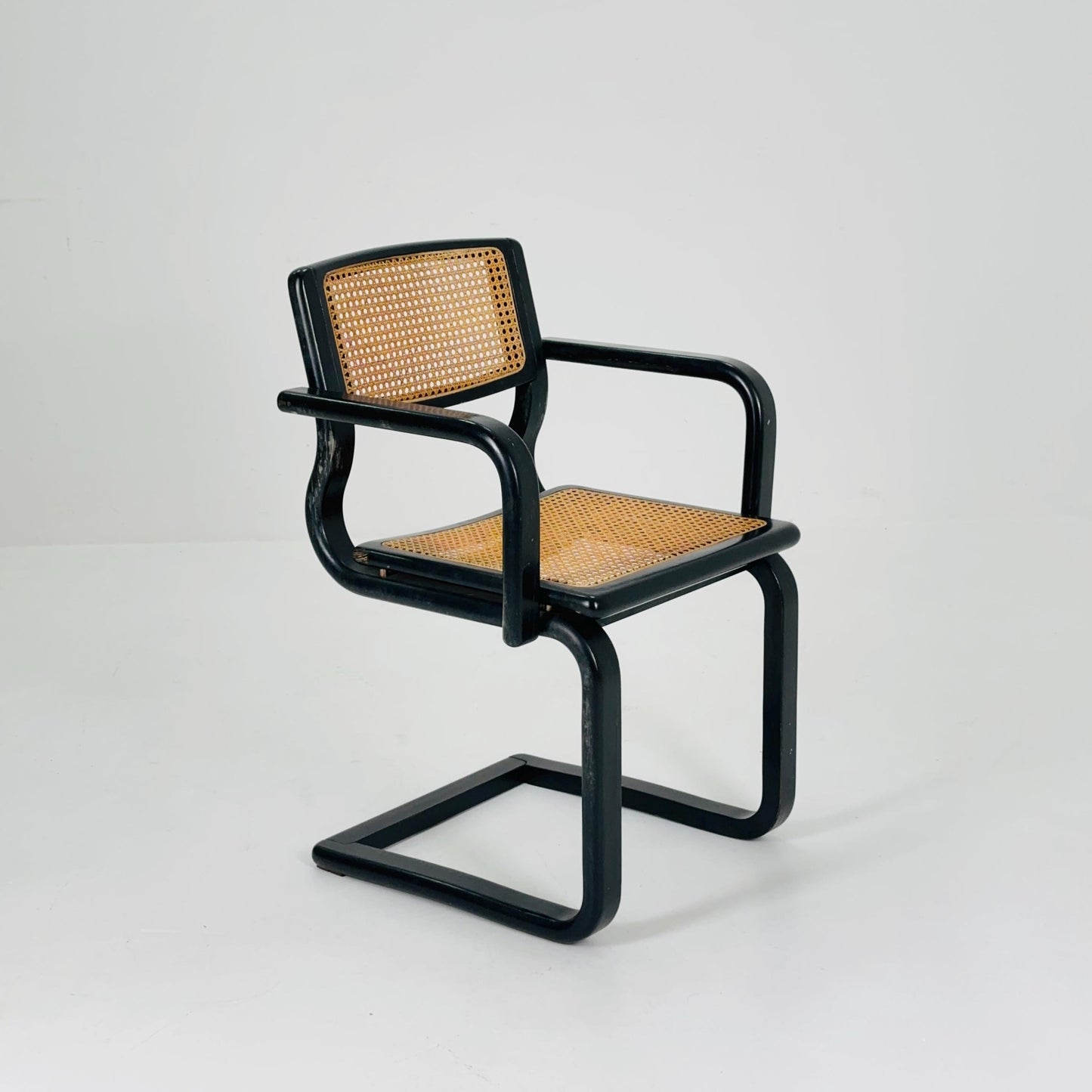 Mid century black wooden cantilever armchair, by Lubke Germany 1970s
