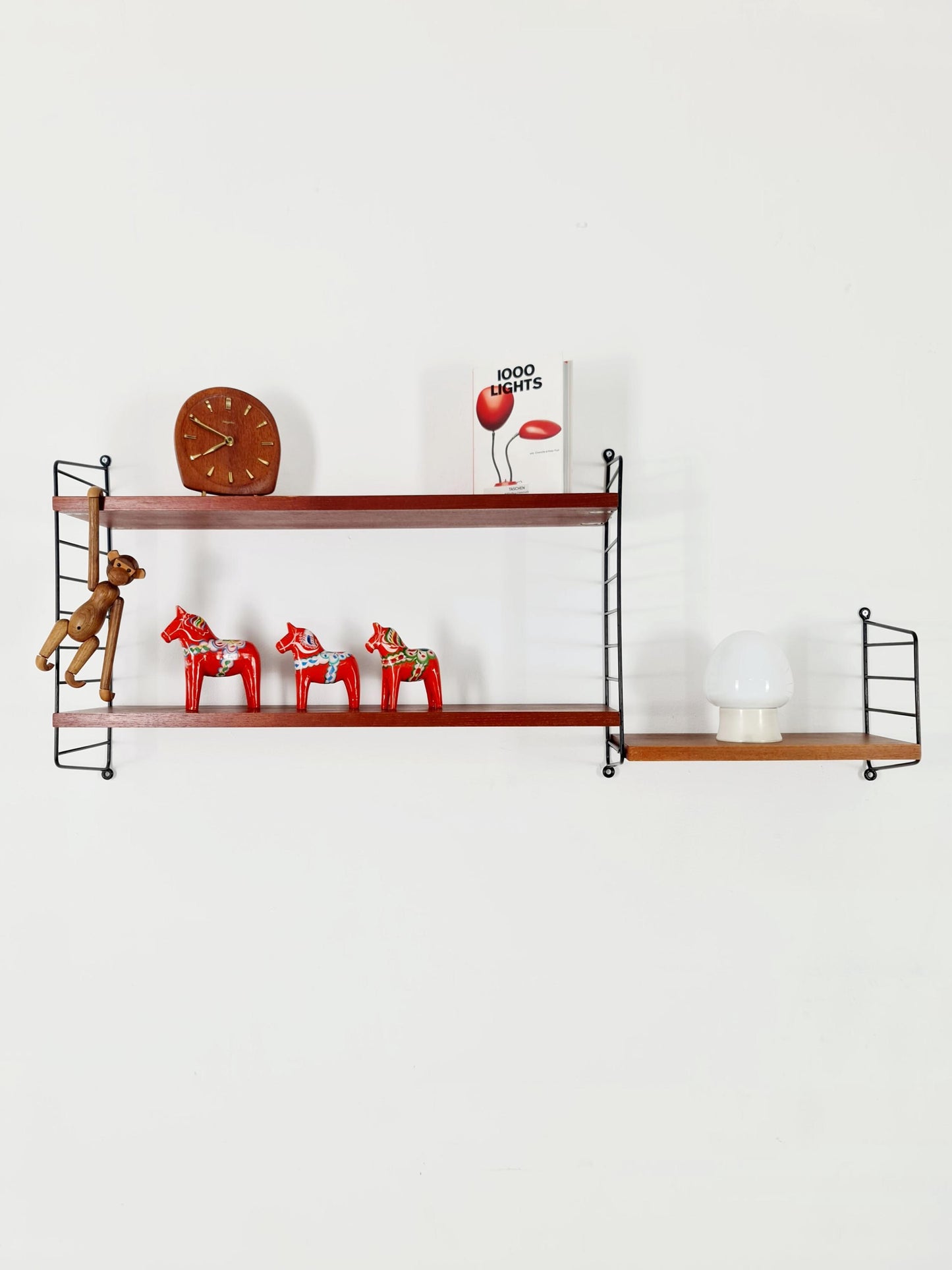 Original MCM Teak shelving system - consists of Black lacquered metal ladders, from string Stockholm 1960s