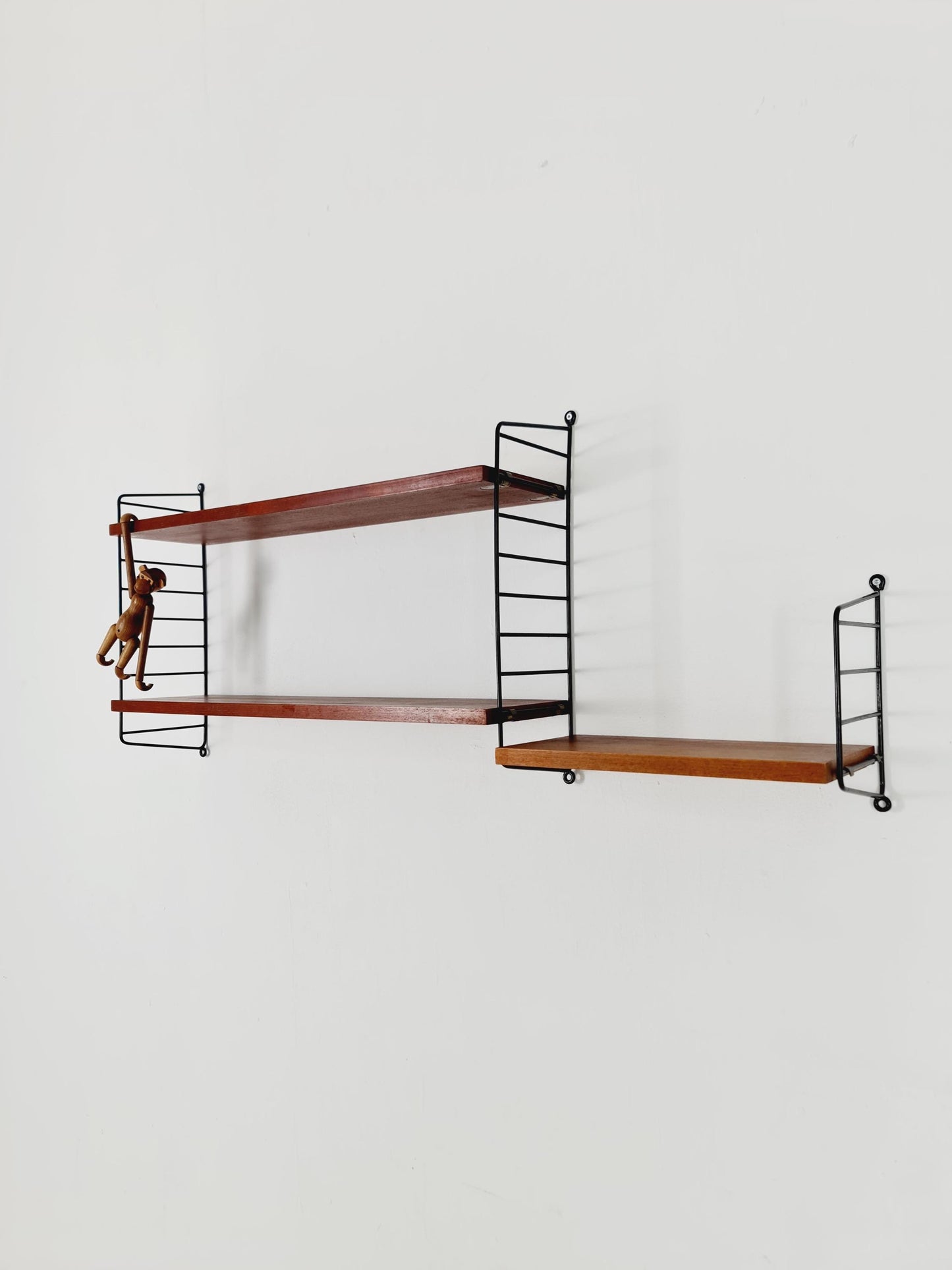 Original MCM Teak shelving system - consists of Black lacquered metal ladders, from string Stockholm 1960s