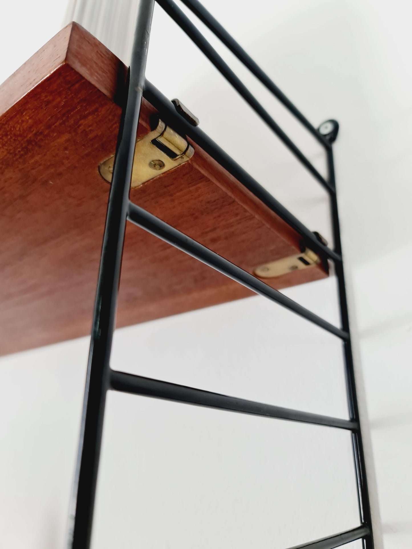 Original MCM Teak shelving system - consists of Black lacquered metal ladders, from string Stockholm 1960s