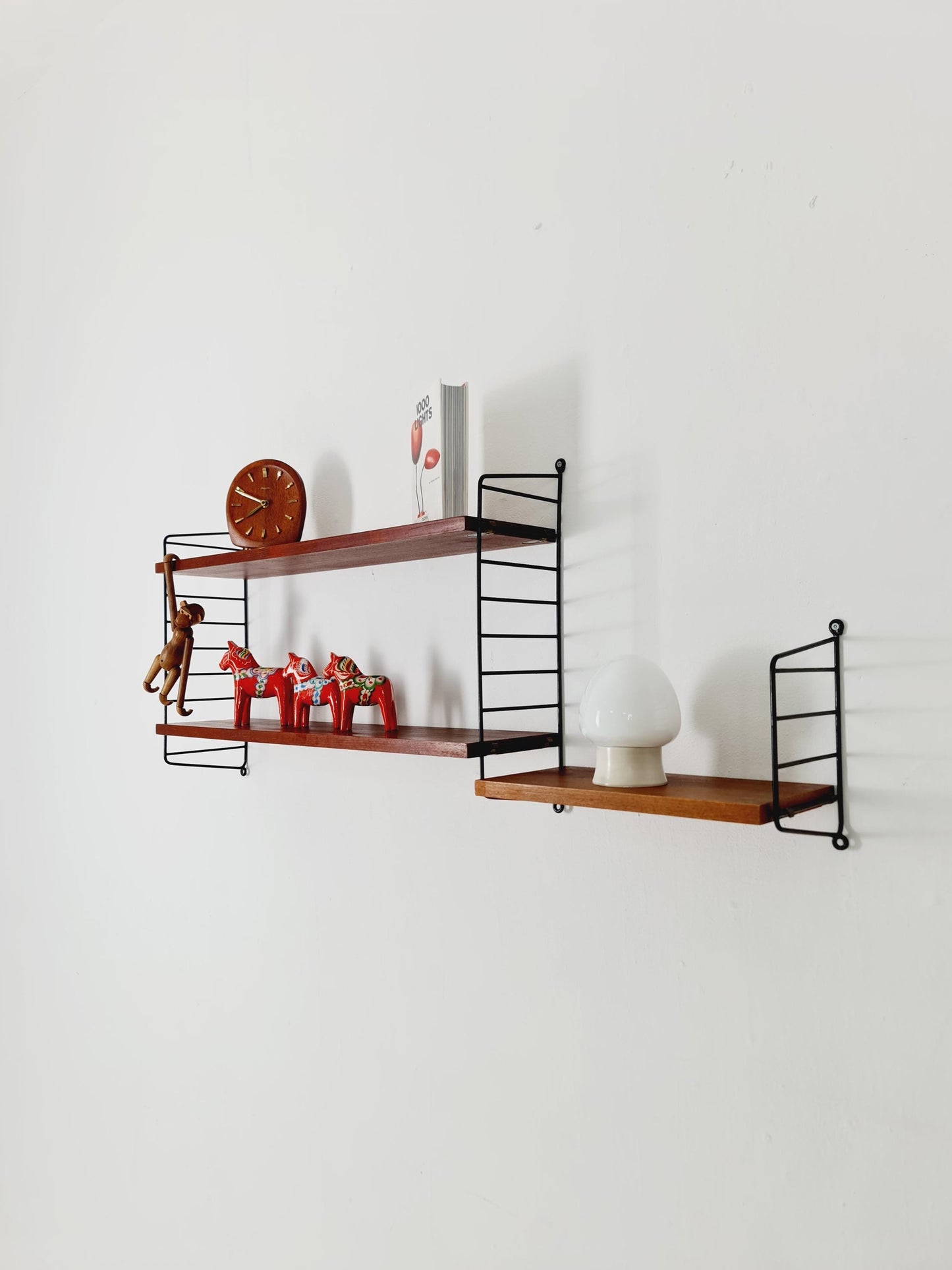 Original MCM Teak shelving system - consists of Black lacquered metal ladders, from string Stockholm 1960s