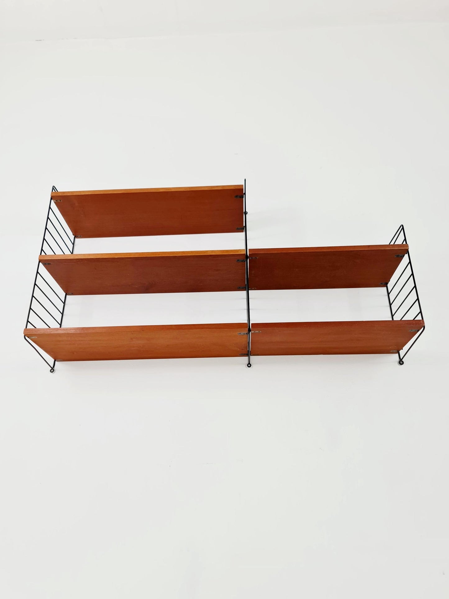 Original MCM Teak shelving system - consists of Black lacquered metal ladders, from string Stockholm 1960s