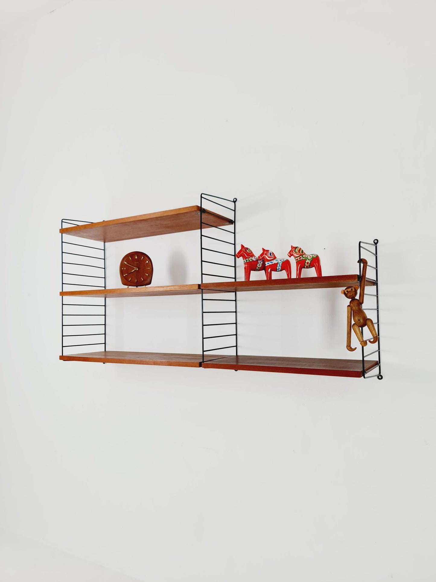 Original MCM Teak shelving system - consists of Black lacquered metal ladders, from string Stockholm 1960s