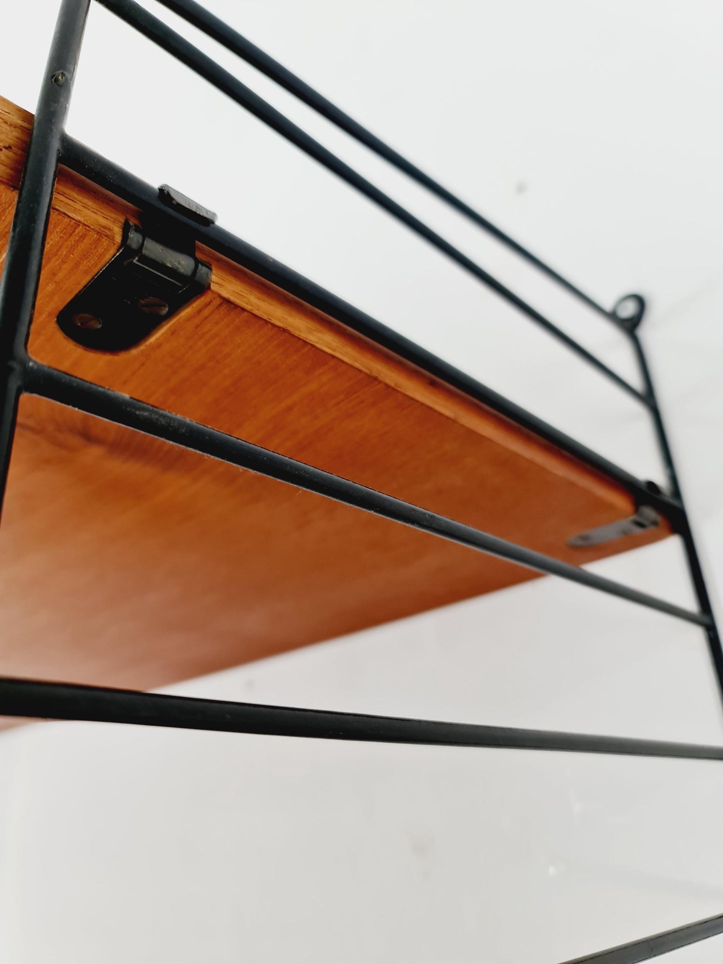 Original MCM Teak shelving system - consists of black lacquered metal ladders, from string Stockholm 1960s
