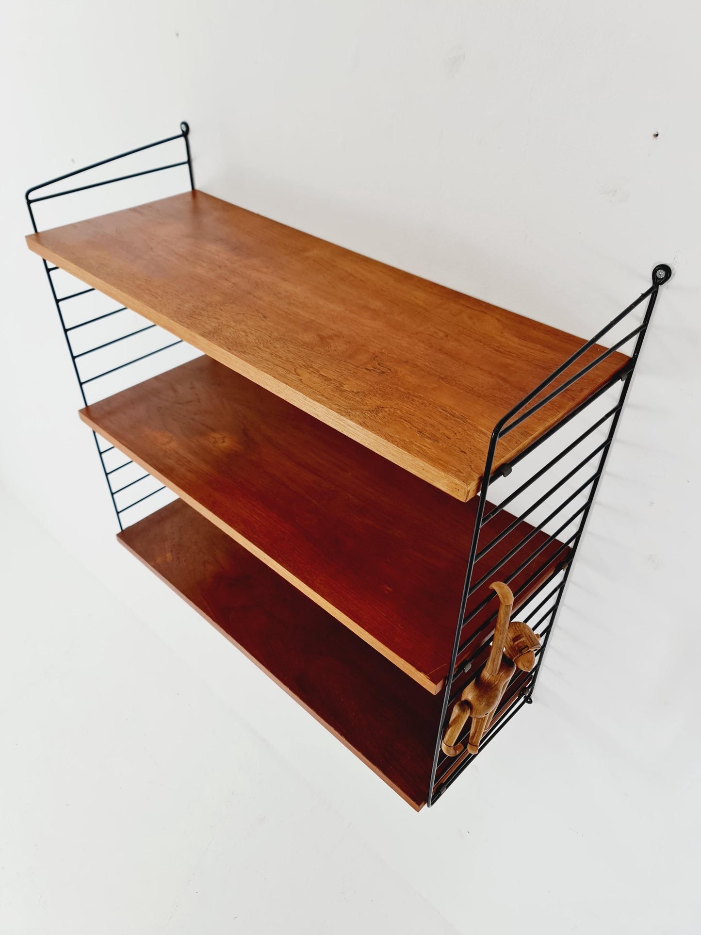 Original MCM Teak shelving system - consists of black lacquered metal ladders, from string Stockholm 1960s