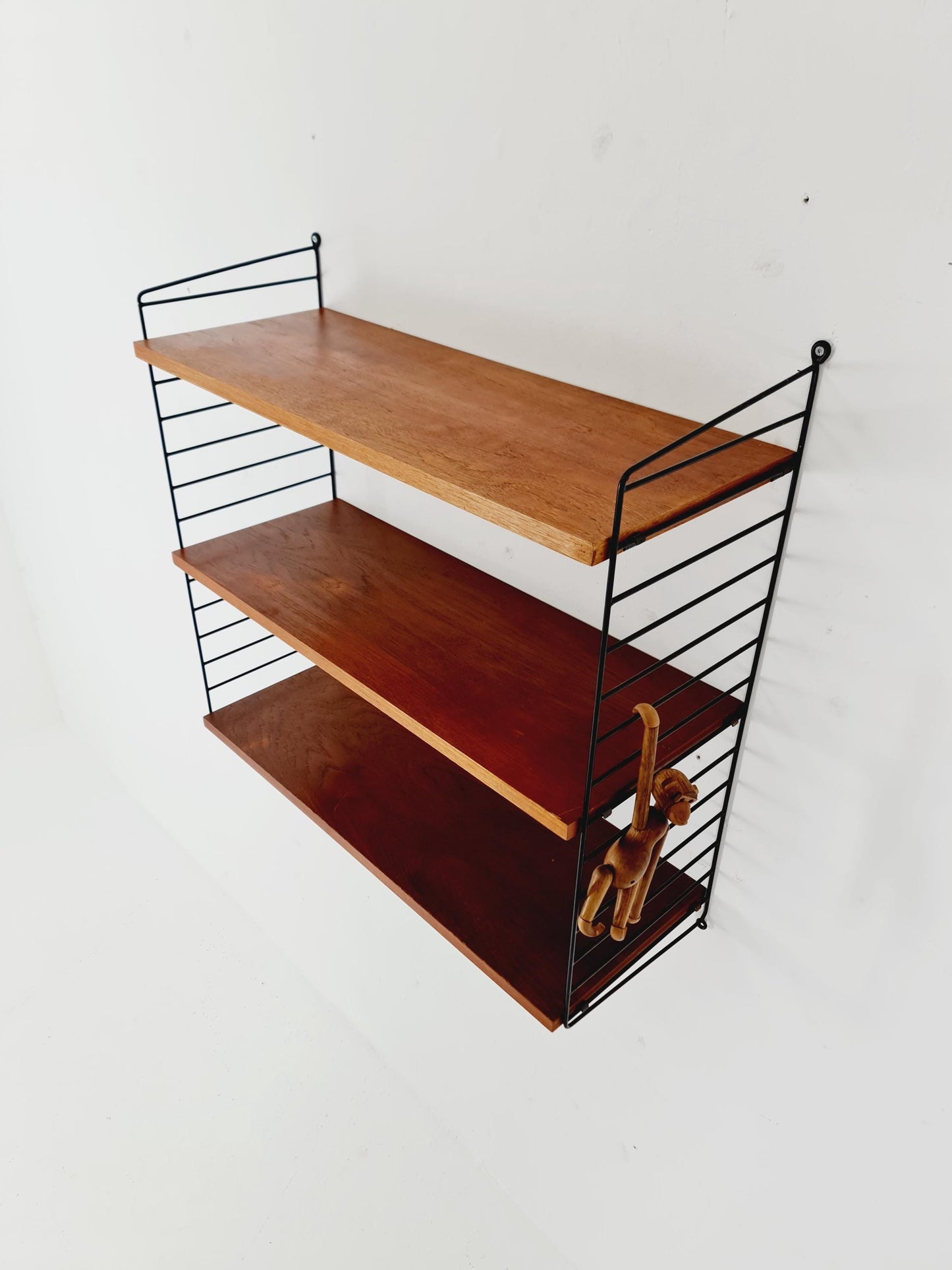 Original MCM Teak shelving system - consists of black lacquered metal ladders, from string Stockholm 1960s