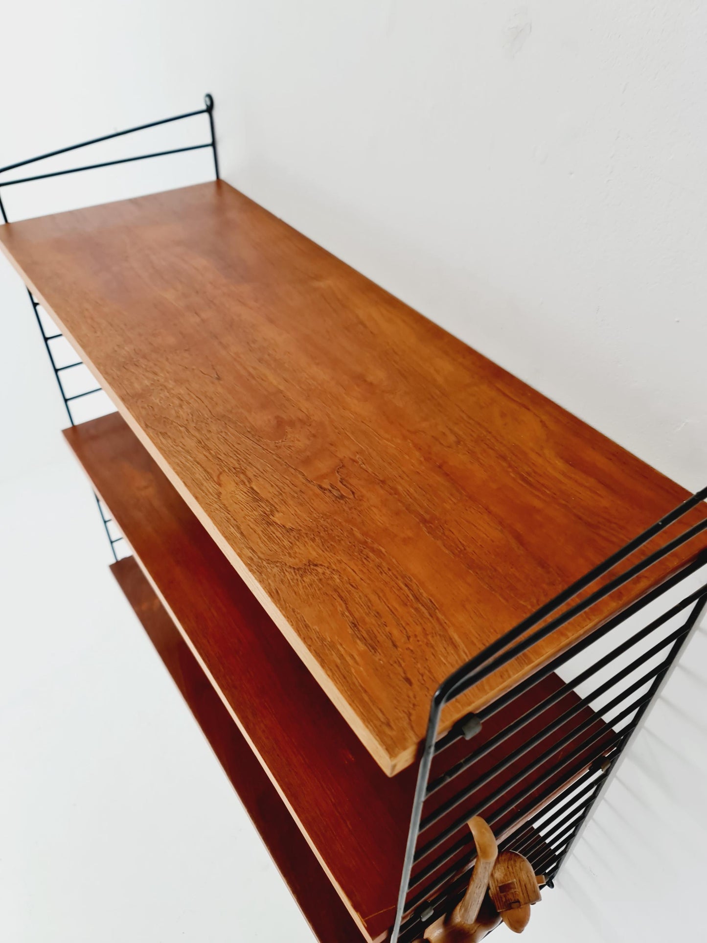 Original MCM Teak shelving system - consists of black lacquered metal ladders, from string Stockholm 1960s