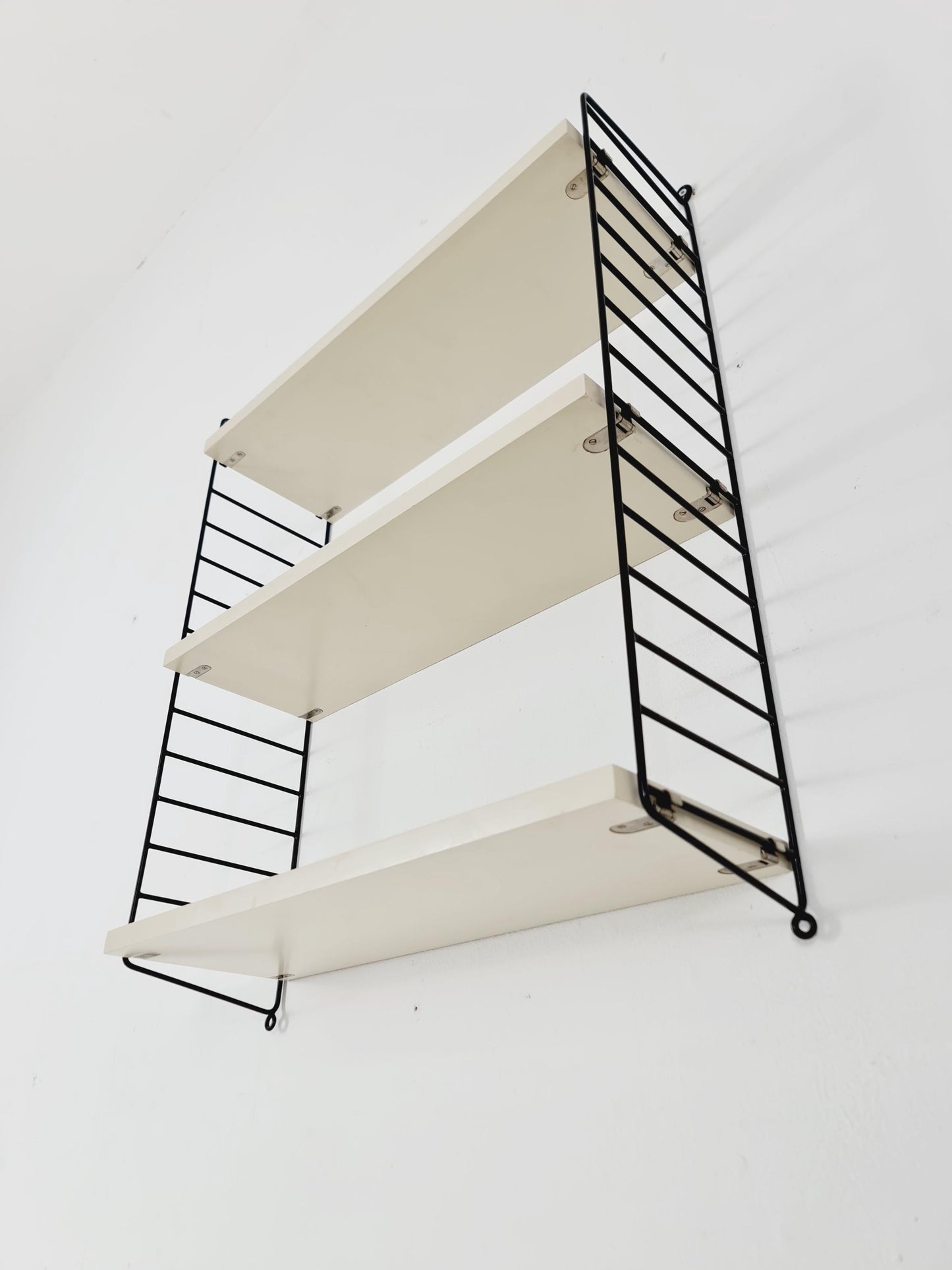 Original MCM wood shelving system - consists of black lacquered metal ladders, from string Stockholm 1960s