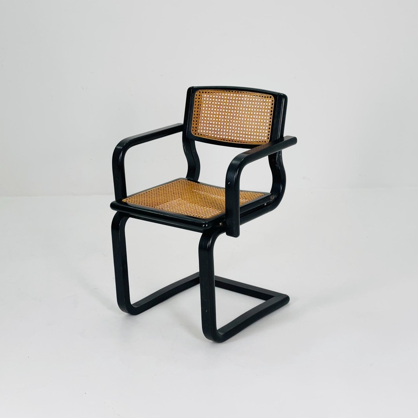 Mid century black wooden cantilever armchair, by Lubke Germany 1970s