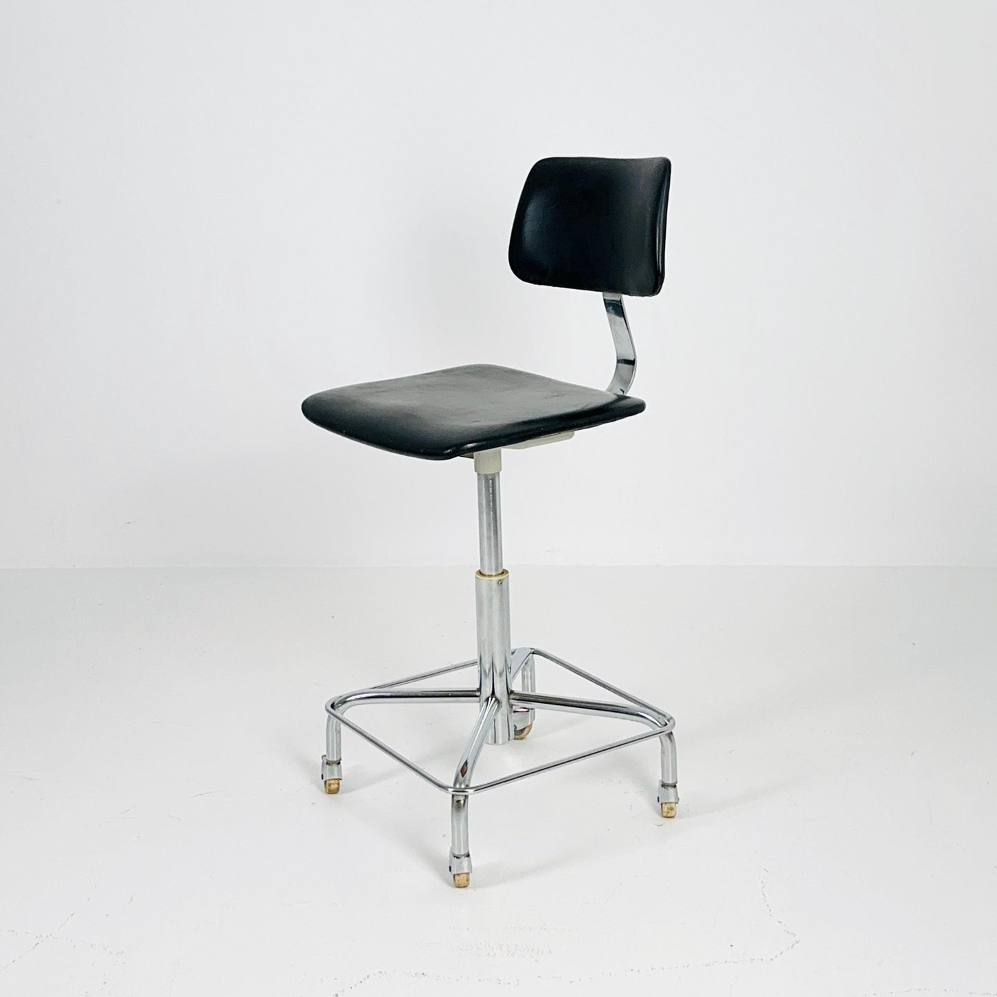 Mid century black faux leather swivel desk chair 1960s Germany