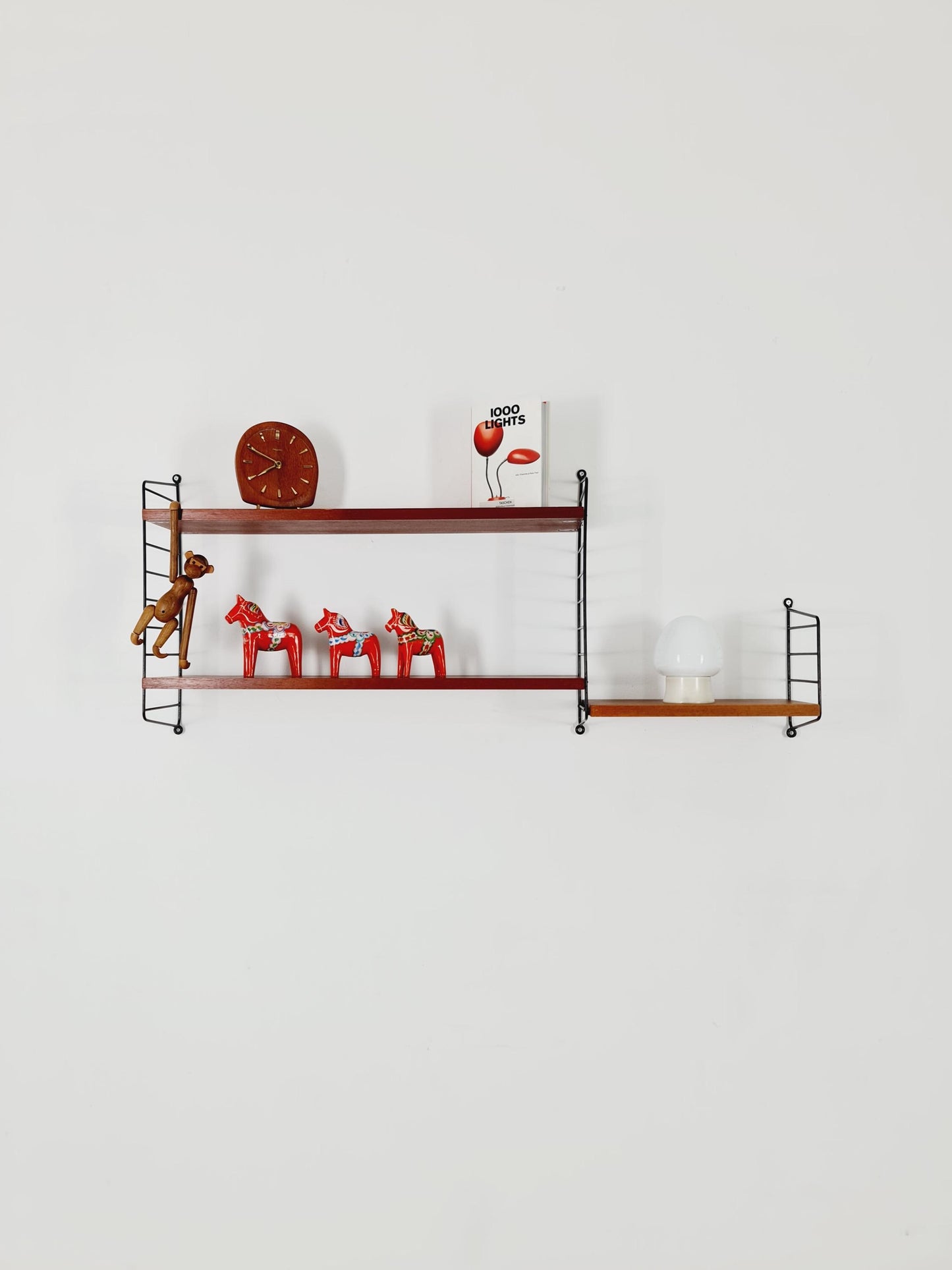 Original MCM Teak shelving system - consists of Black lacquered metal ladders, from string Stockholm 1960s