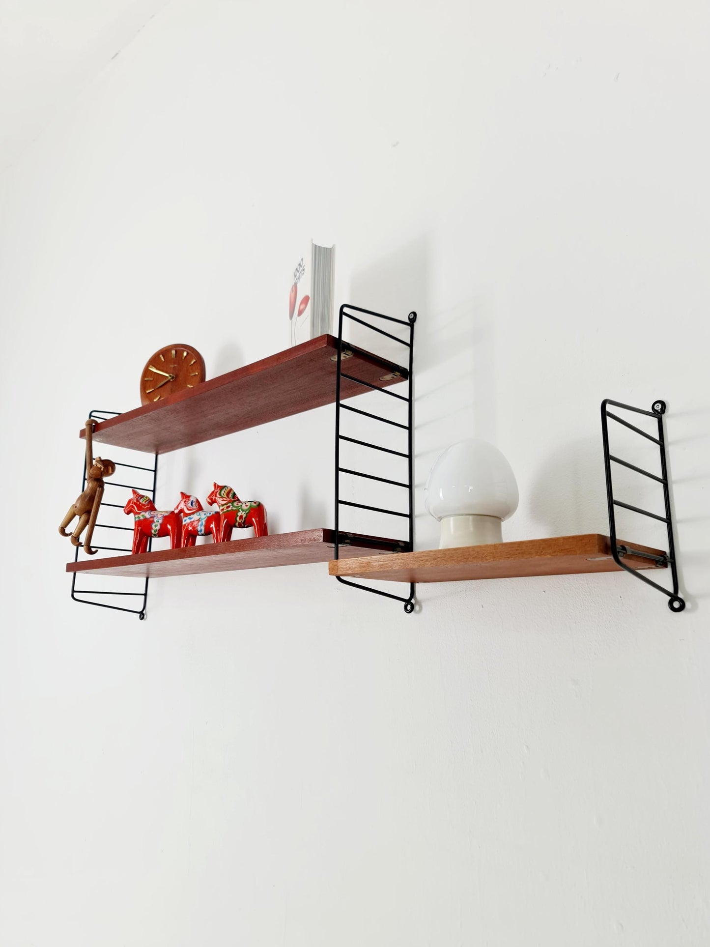Original MCM Teak shelving system - consists of Black lacquered metal ladders, from string Stockholm 1960s