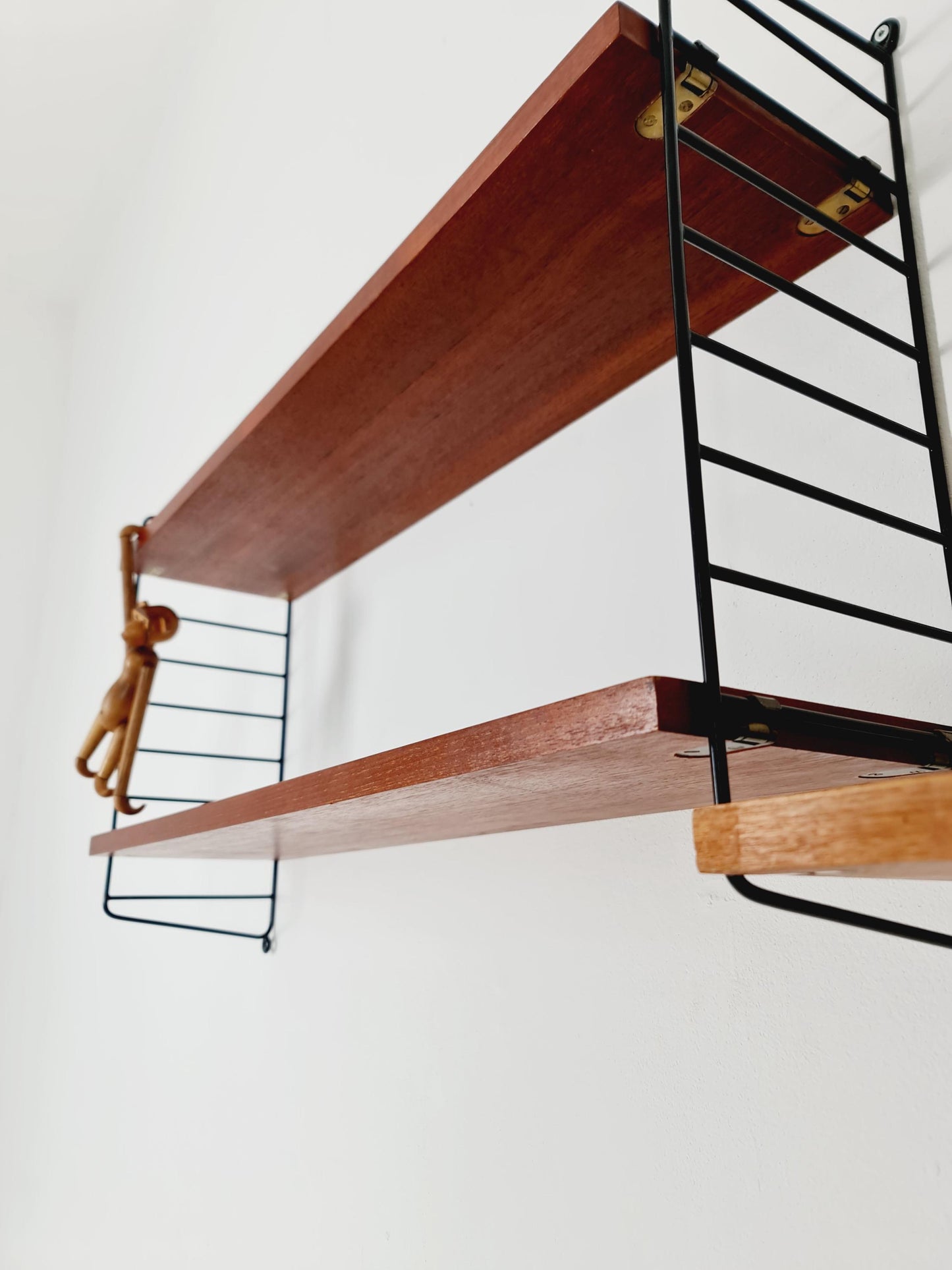 Original MCM Teak shelving system - consists of Black lacquered metal ladders, from string Stockholm 1960s