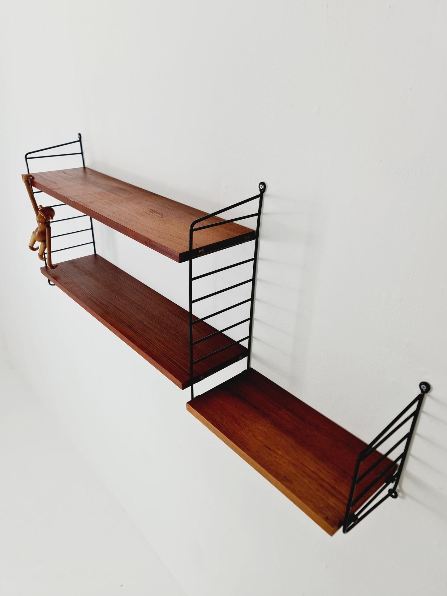 Original MCM Teak shelving system - consists of Black lacquered metal ladders, from string Stockholm 1960s