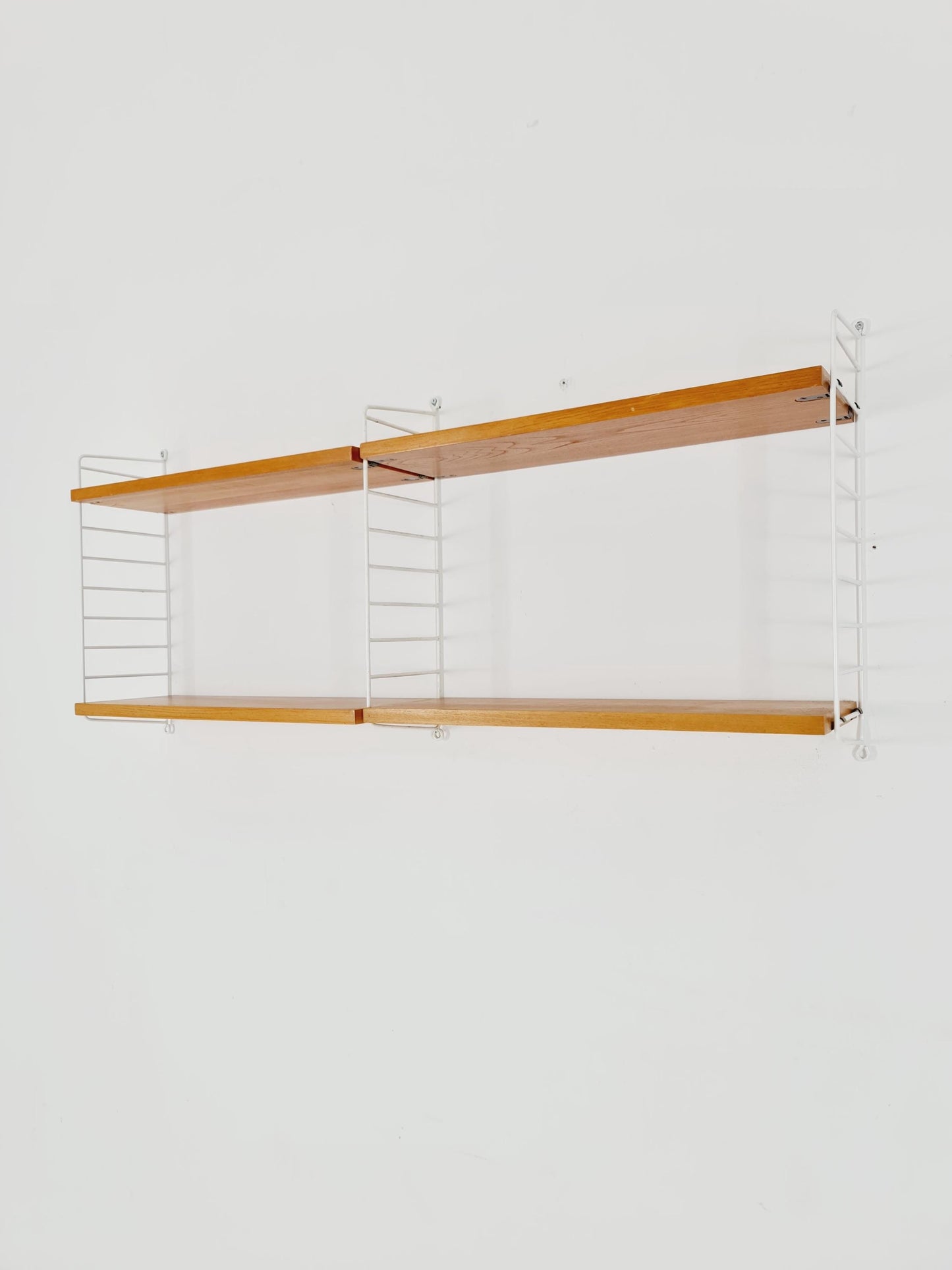 Original MCM Ash shelving system - consists of Black lacquered metal ladders, from string Stockholm 1960s