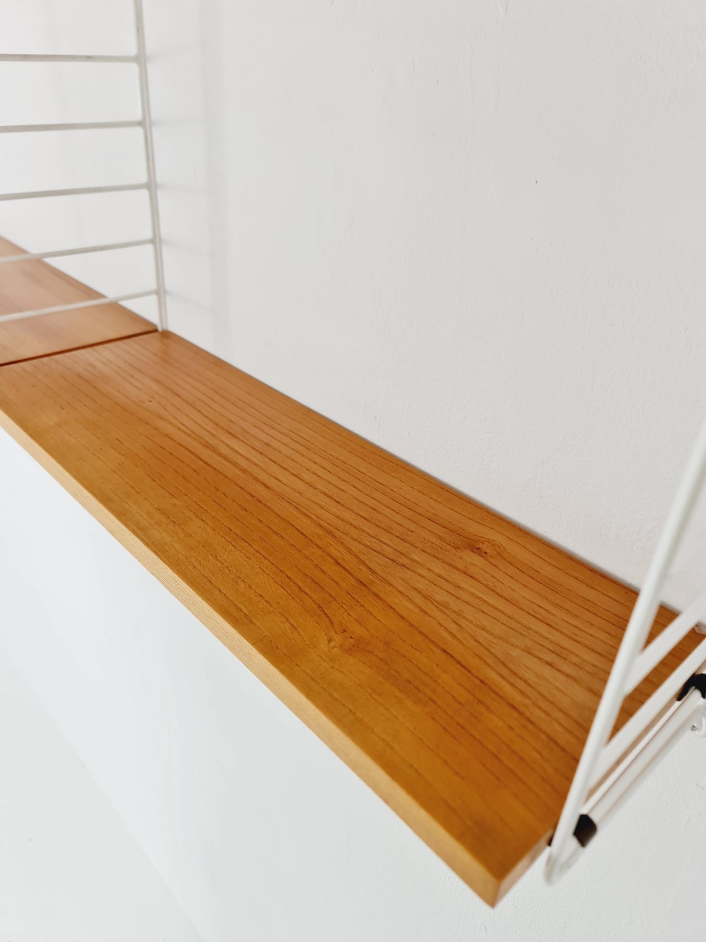 Original MCM Ash shelving system - consists of Black lacquered metal ladders, from string Stockholm 1960s