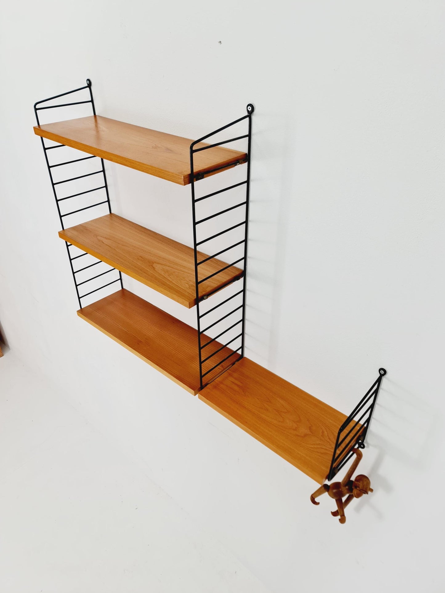 Original MCM Teak shelving system - consists of Black lacquered metal ladders, from string Stockholm 1960s